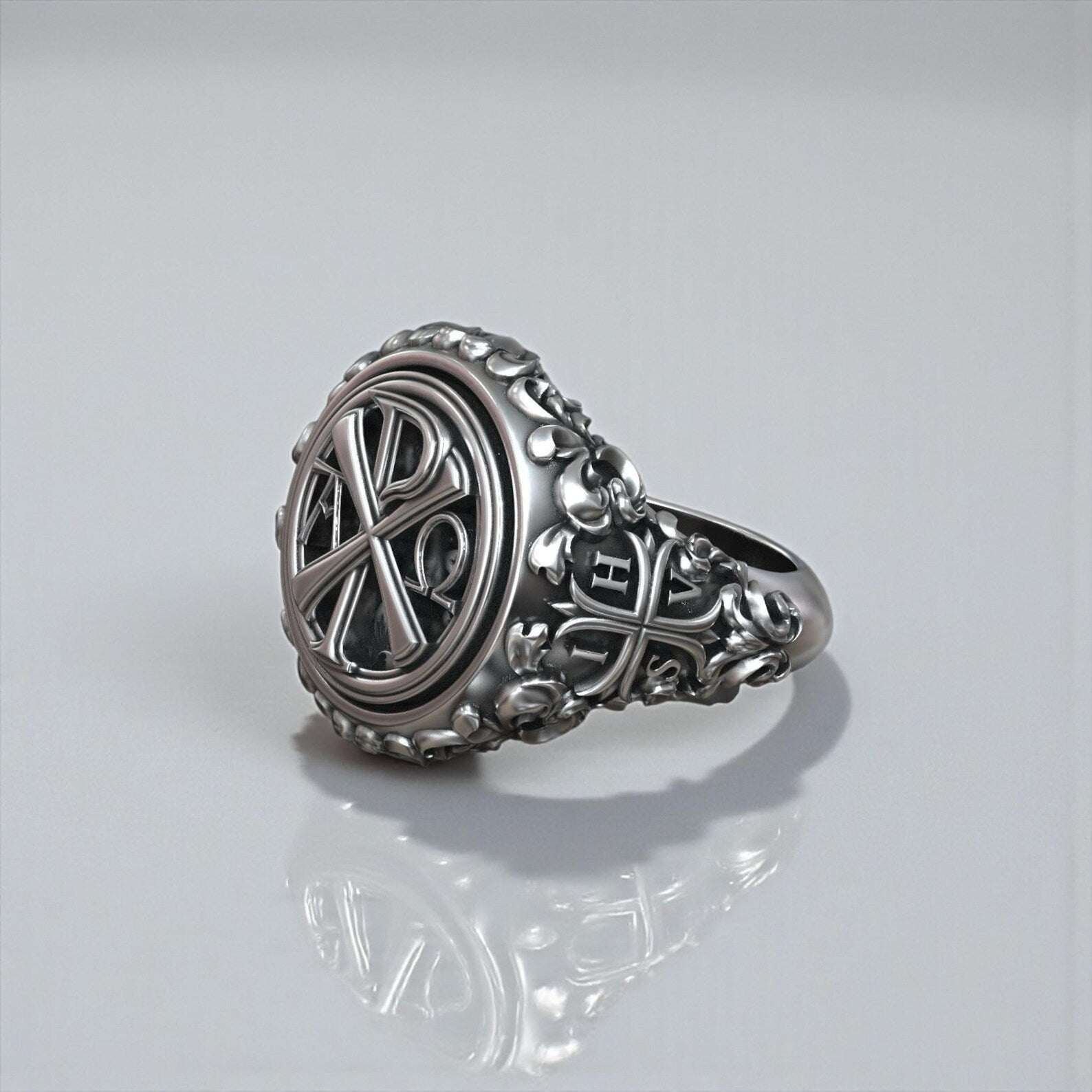 Sterling silver Jesus Christ monogram signet ring presented as a meaningful Valentine’s Day, anniversary or birthday gift for Christian men who value spiritual jewelry