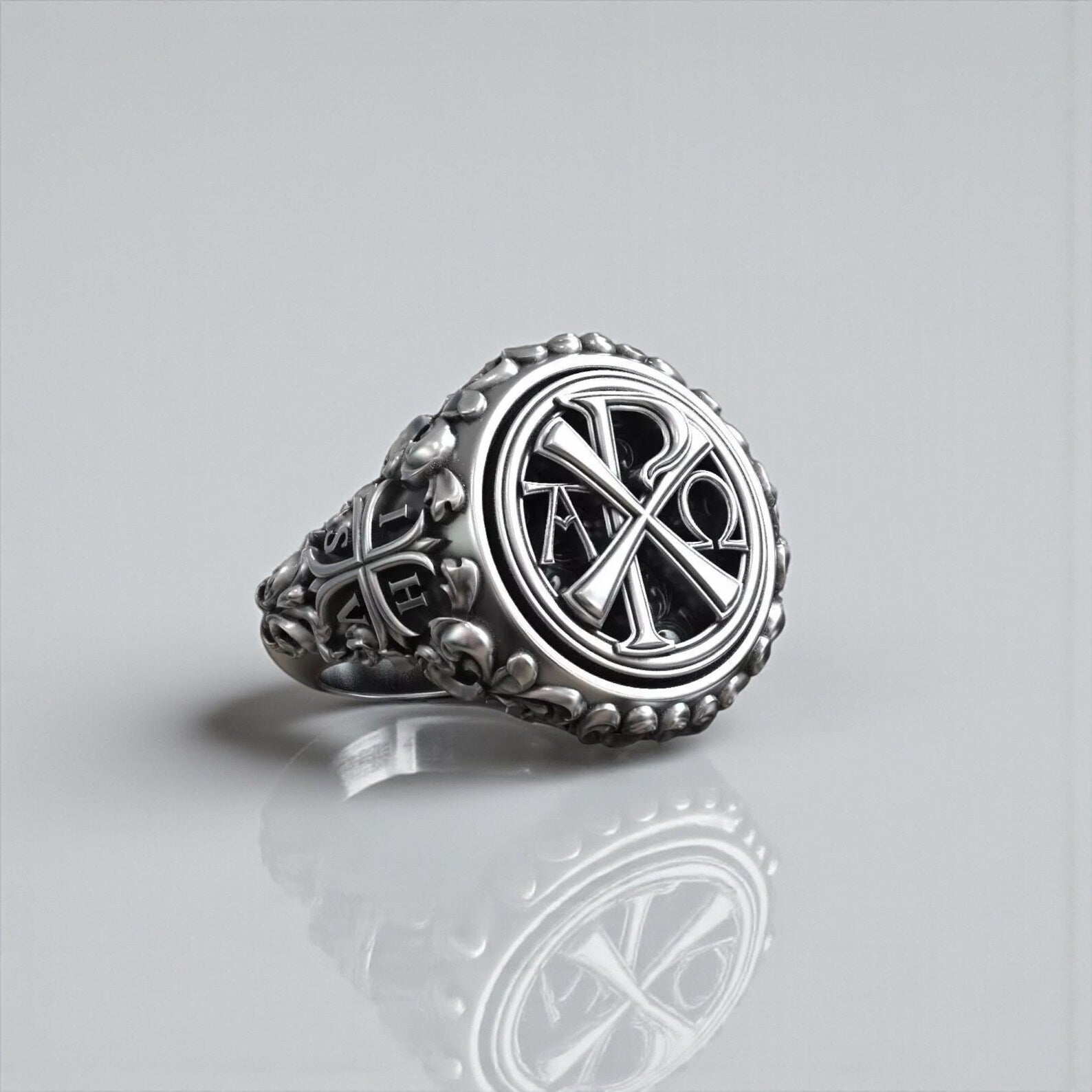 Chi Rho Alpha Omega Jesus Christ signet ring crafted from 925 sterling silver, featuring sacred Christian symbols and oxidized gothic finish, designed as a bold faith inspired men’s statement ring