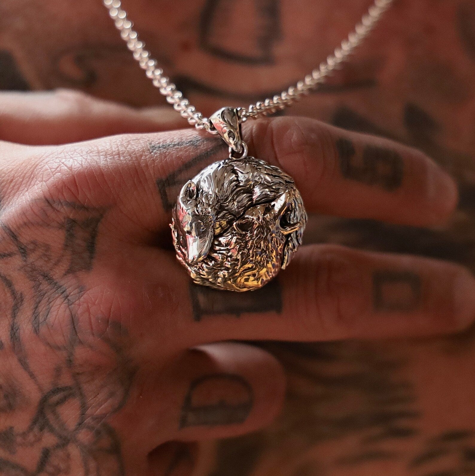 Bold silver wolf pendant with gold-plated accents, designed for men who appreciate animal-inspired symbolic jewelry. This handcrafted Yin Yang necklace offers both elegance and strength, making it a perfect accessory for everyday wear. A best-selling gift for boyfriends, husbands, and fathers who embody both the warrior and the wise spirit.