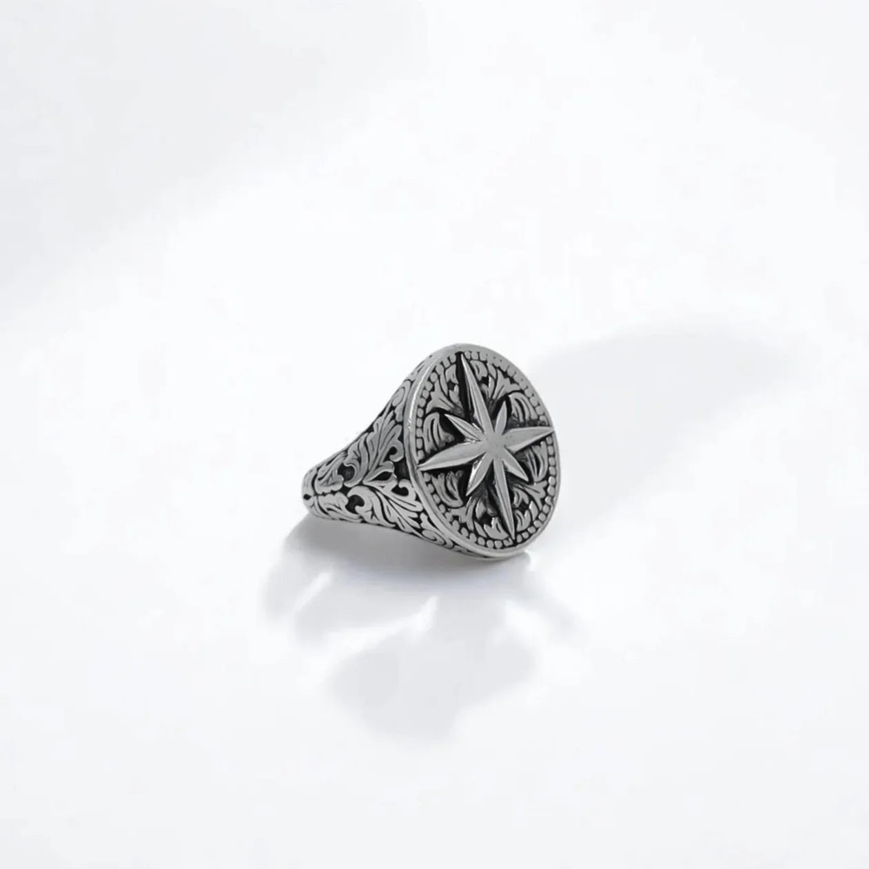 A handcrafted 925 sterling silver compass ring featuring an intricately detailed compass rose design, symbolizing guidance, direction, and inner strength. Made for men who embrace the spirit of exploration, this nautical signet ring is perfect for birthdays, anniversaries, or as a meaningful gift for anyone beginning a new chapter in life.