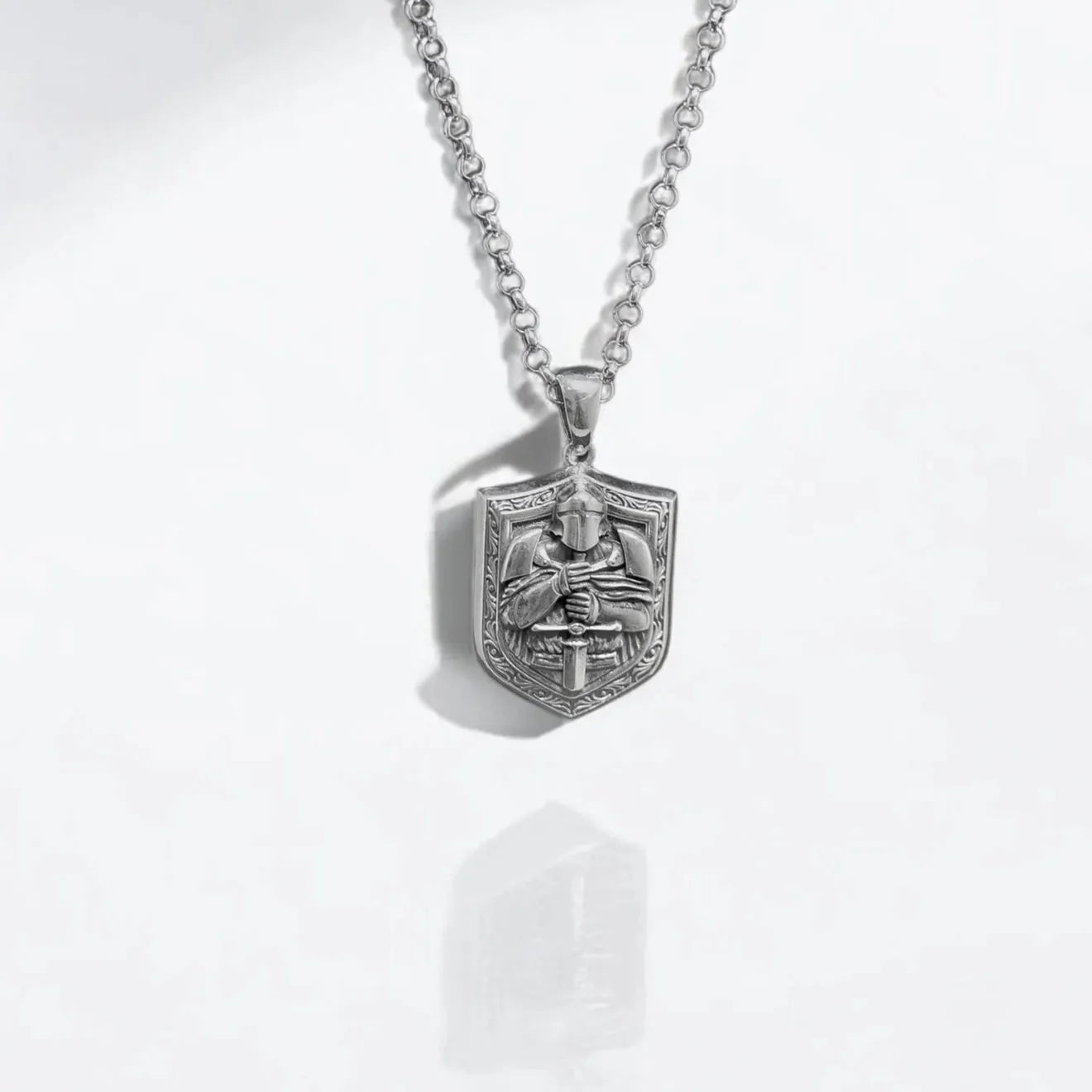 Handcrafted silver warrior armor necklace pendant featuring a medieval knight holding a sword. Perfect for men who love fantasy, gothic, and historical jewelry. Durable sterling silver design, ideal for cosplay, collectors, and unique gift ideas.