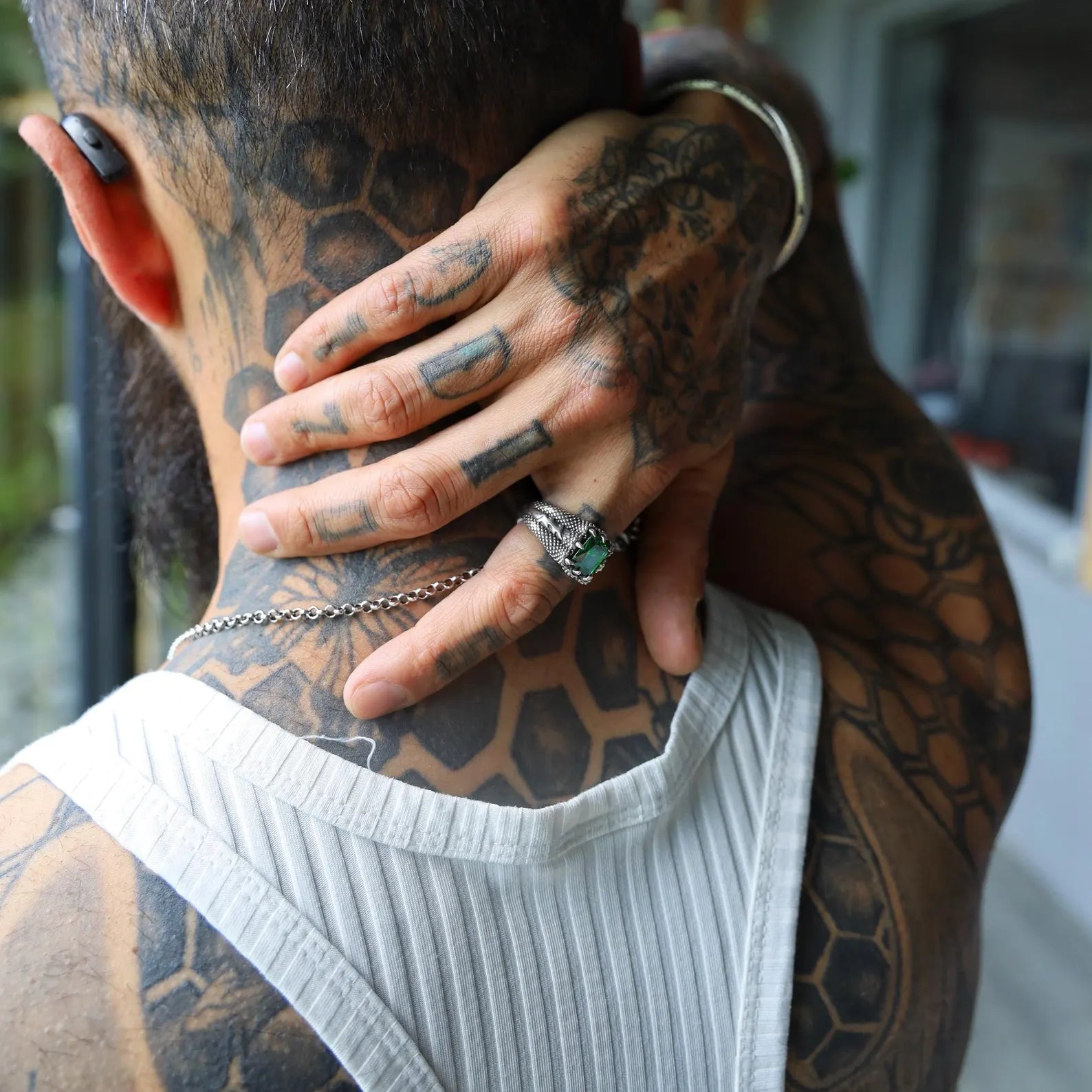 Close-up of this minimalist sterling silver emerald cut zircon ring, showcasing the sleek lines and refined craftsmanship. This handcrafted piece captures the essence of understated luxury and timeless elegance, perfect for those who appreciate minimalist jewelry with a unique gemstone focal point that adds a touch of sophistication to any look.