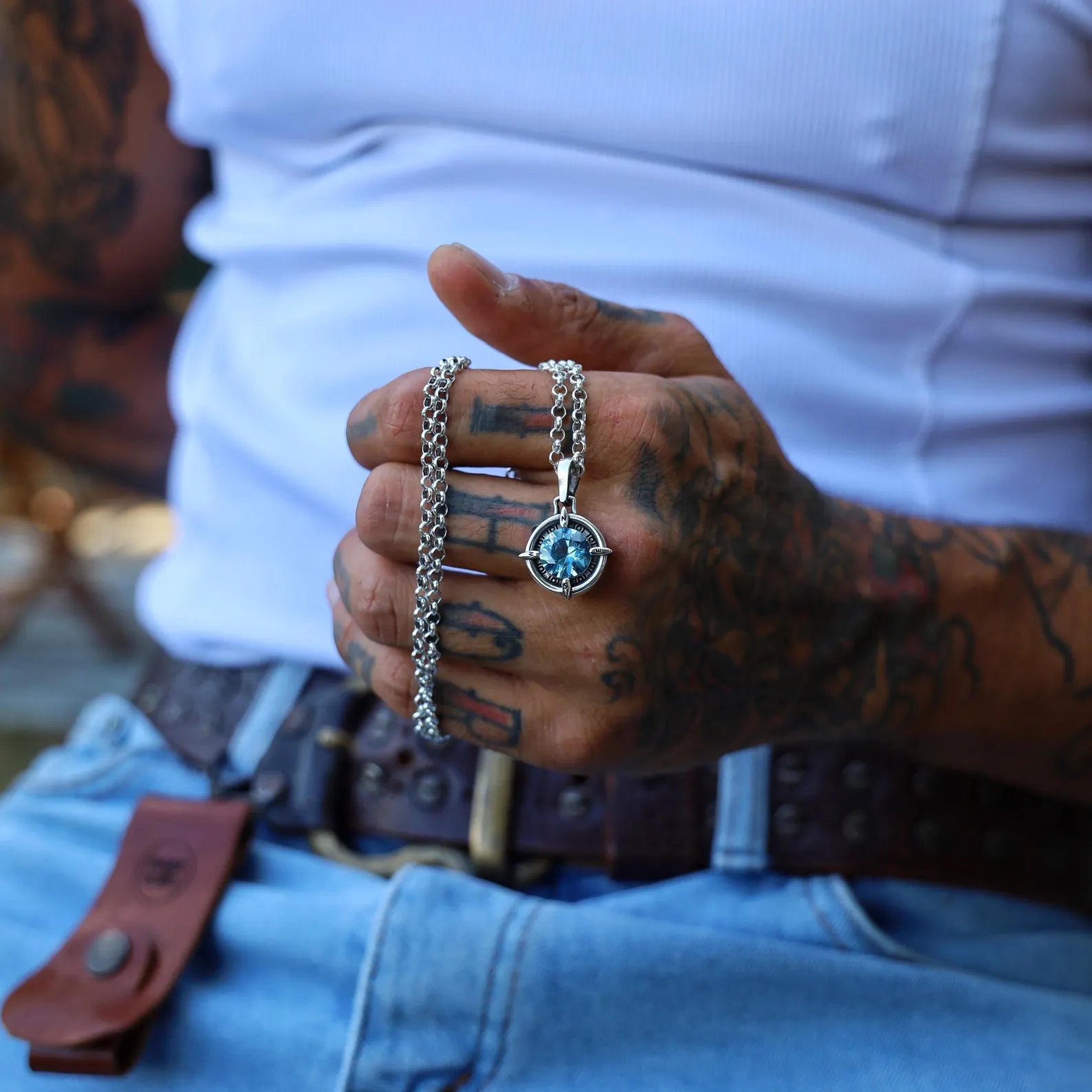 Sterling silver aquamarine compass necklace designed with a round cut gemstone symbolizing guidance and protection. This nautical-inspired pendant makes a meaningful March birthstone gift for her or him. Perfect for travelers, seafarers, and those who cherish adventure, handmade craftsmanship, and timeless silver jewelry.