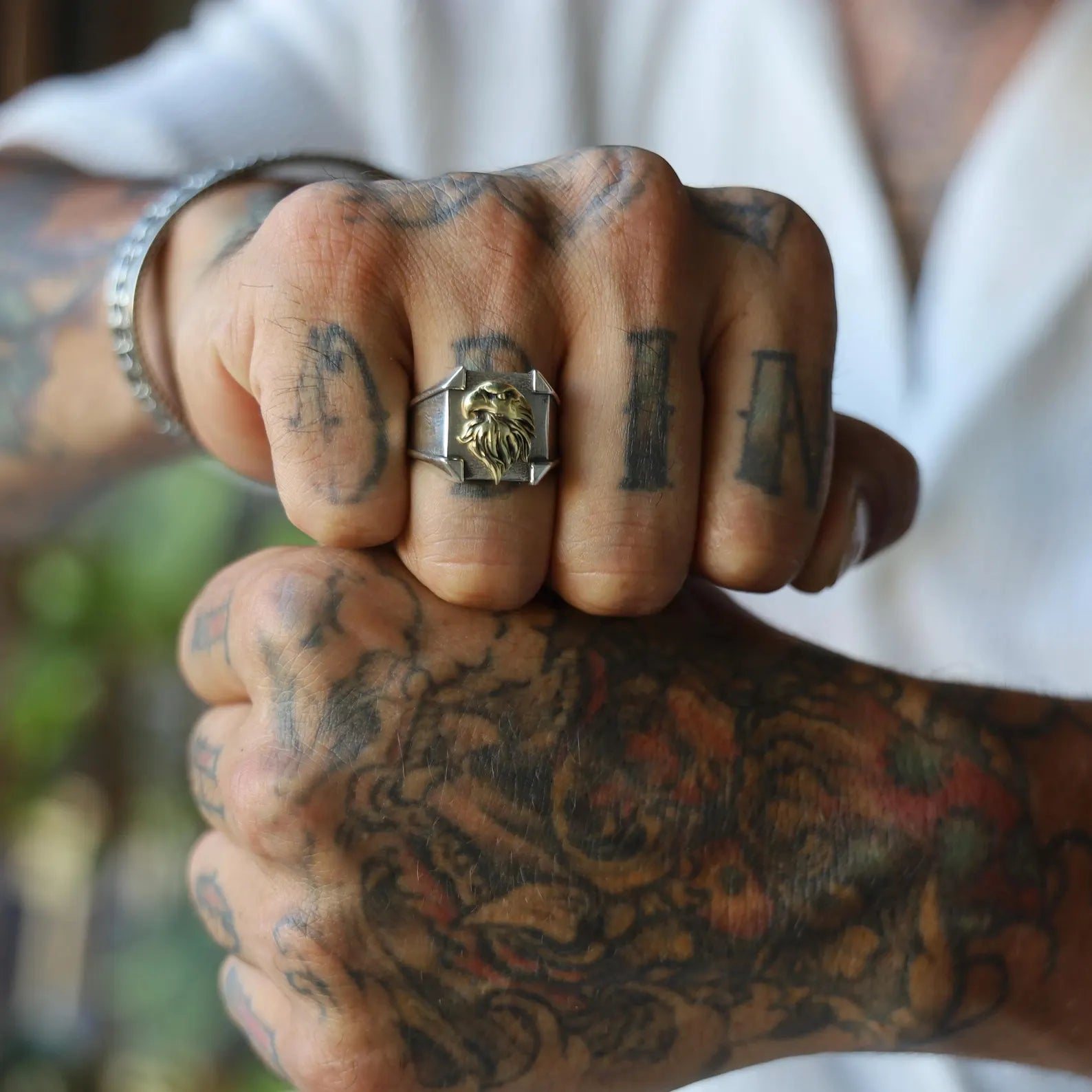 High-resolution image of a sterling silver signet ring with a bold cross emblem, handmade for men seeking a faith-inspired accessory that combines gothic elegance, spiritual meaning, and vintage craftsmanship in a timeless pinky ring design.