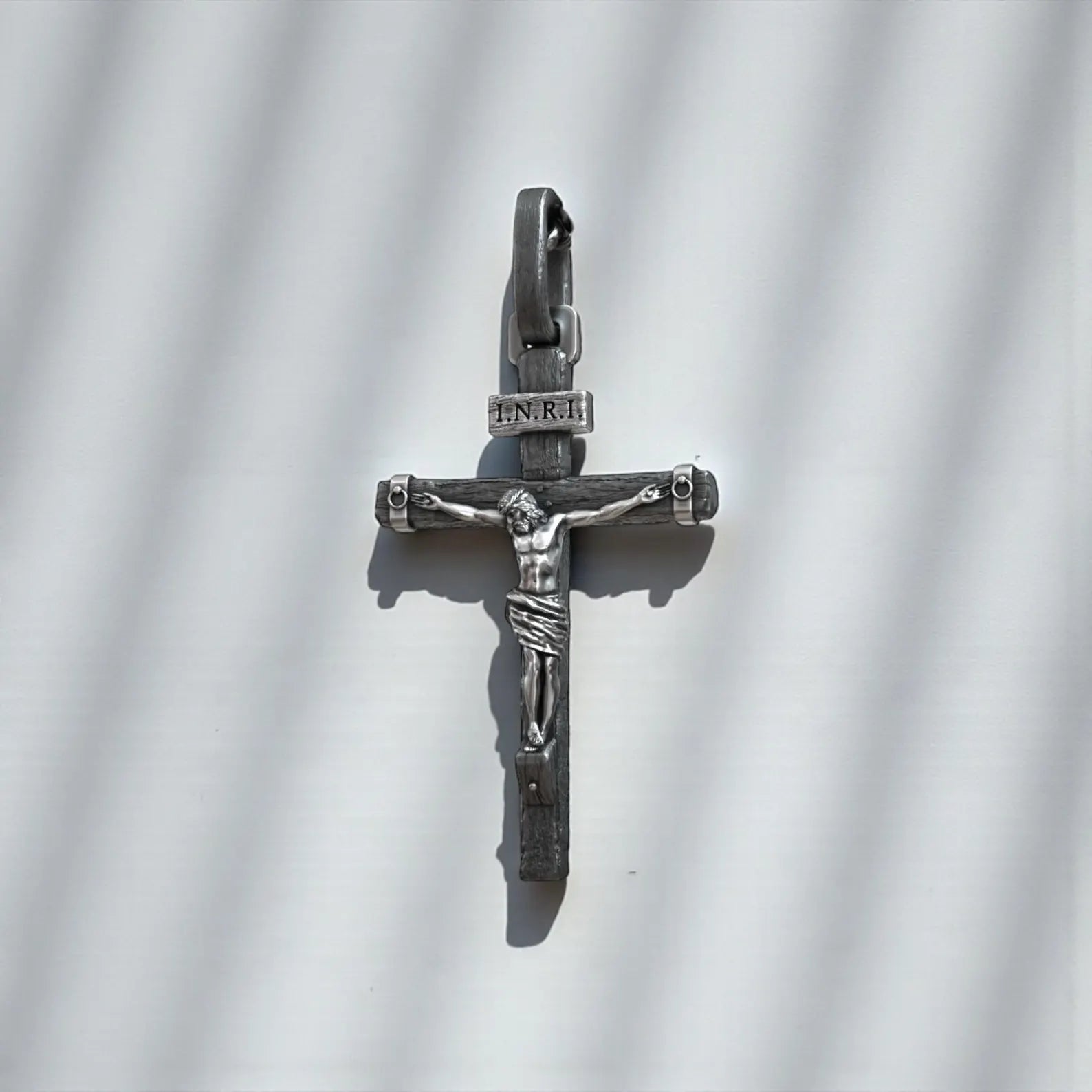 Sterling silver INRI Jesus Christ cross necklace for men, handcrafted religious jewelry representing faith, sacrifice, redemption, and timeless Christian belief