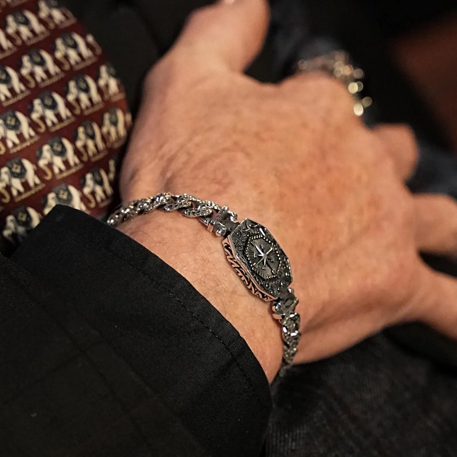 Unique men’s sterling silver bracelet with bold chain and compass symbol centerpiece. Handmade with oxidized detailing for a rugged Viking aesthetic, this bracelet is inspired by Norse mythology and nautical symbolism. A perfect personalized gift for him, ideal for anniversaries, birthdays, or as a bold men’s fashion accessory.