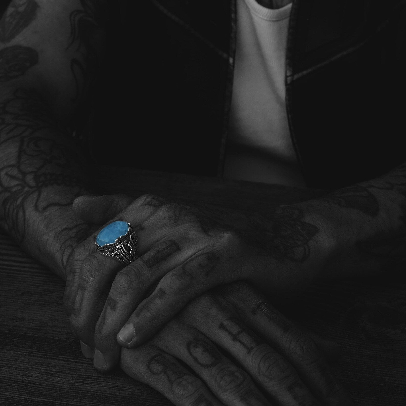 A bold men’s ring crafted with a genuine aquamarine center stone and detailed gothic-style silverwork, handcrafted to deliver lasting quality and timeless symbolism. Representing tranquility and spiritual clarity, this artisan piece makes a unique anniversary or Father’s Day gift for a man with refined yet daring style.