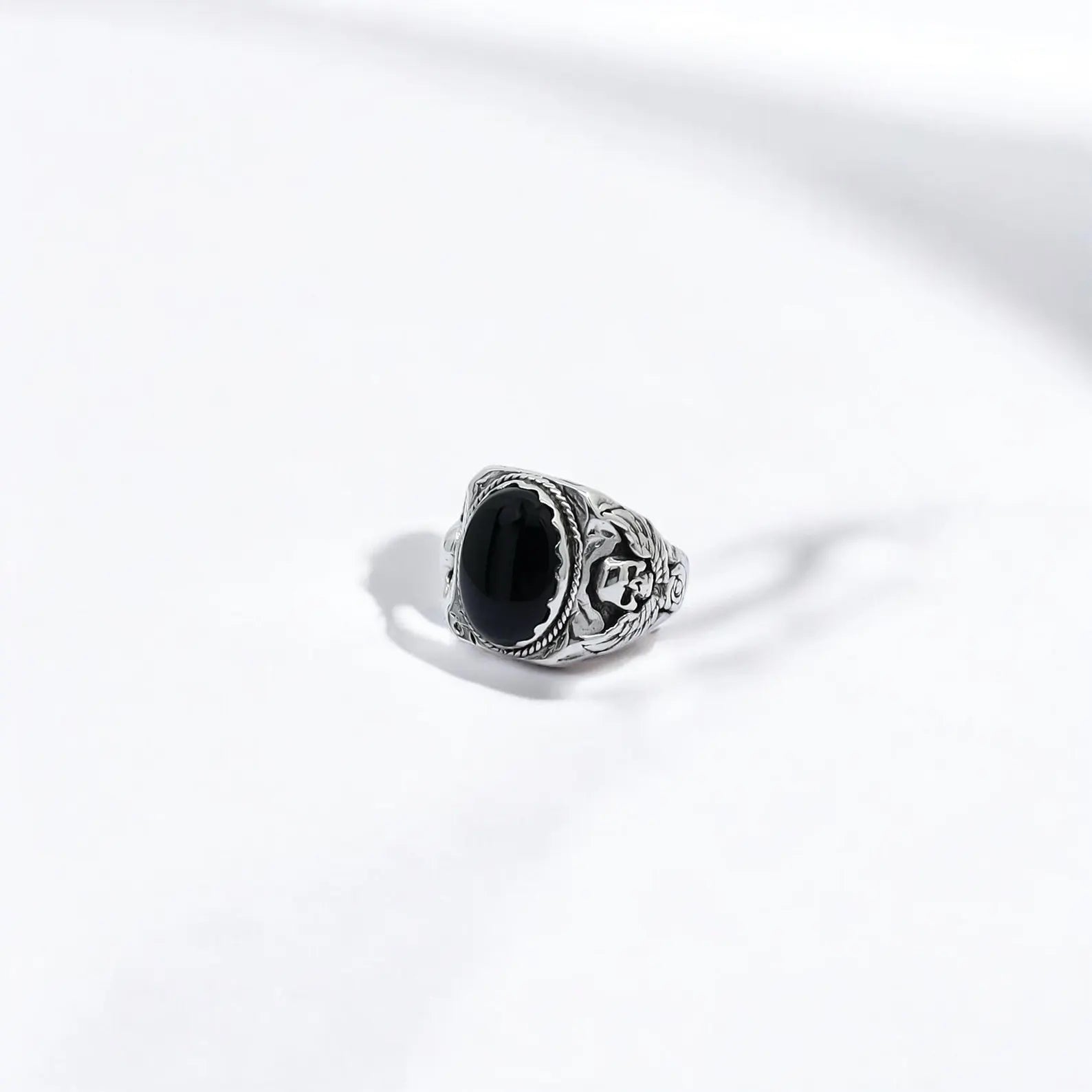 This gothic skull ring, forged from high-quality sterling silver and crowned with a natural black onyx gemstone, offers a blend of mysticism and masculinity. A perfect reflection of strength and personal style, handcrafted for those who wear their identity with pride. A true statement piece that complements both minimalist and dramatic outfits.