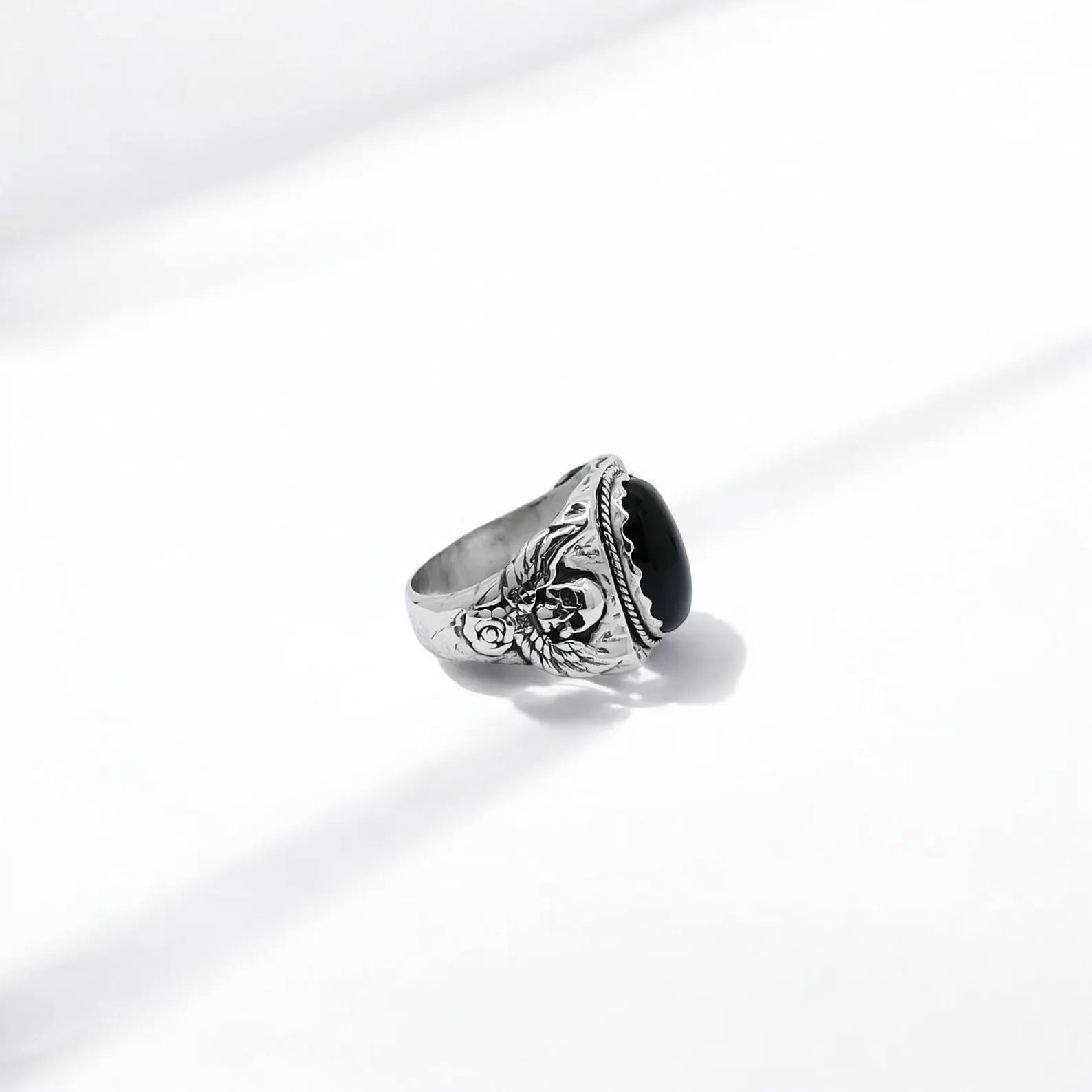 Elegant yet fierce, this handcrafted silver skull ring with a black onyx gemstone is designed for men who appreciate unique, artistic jewelry. A perfect gift for those celebrating a Labor Day, anniversary, or birthday with something truly personal and striking.