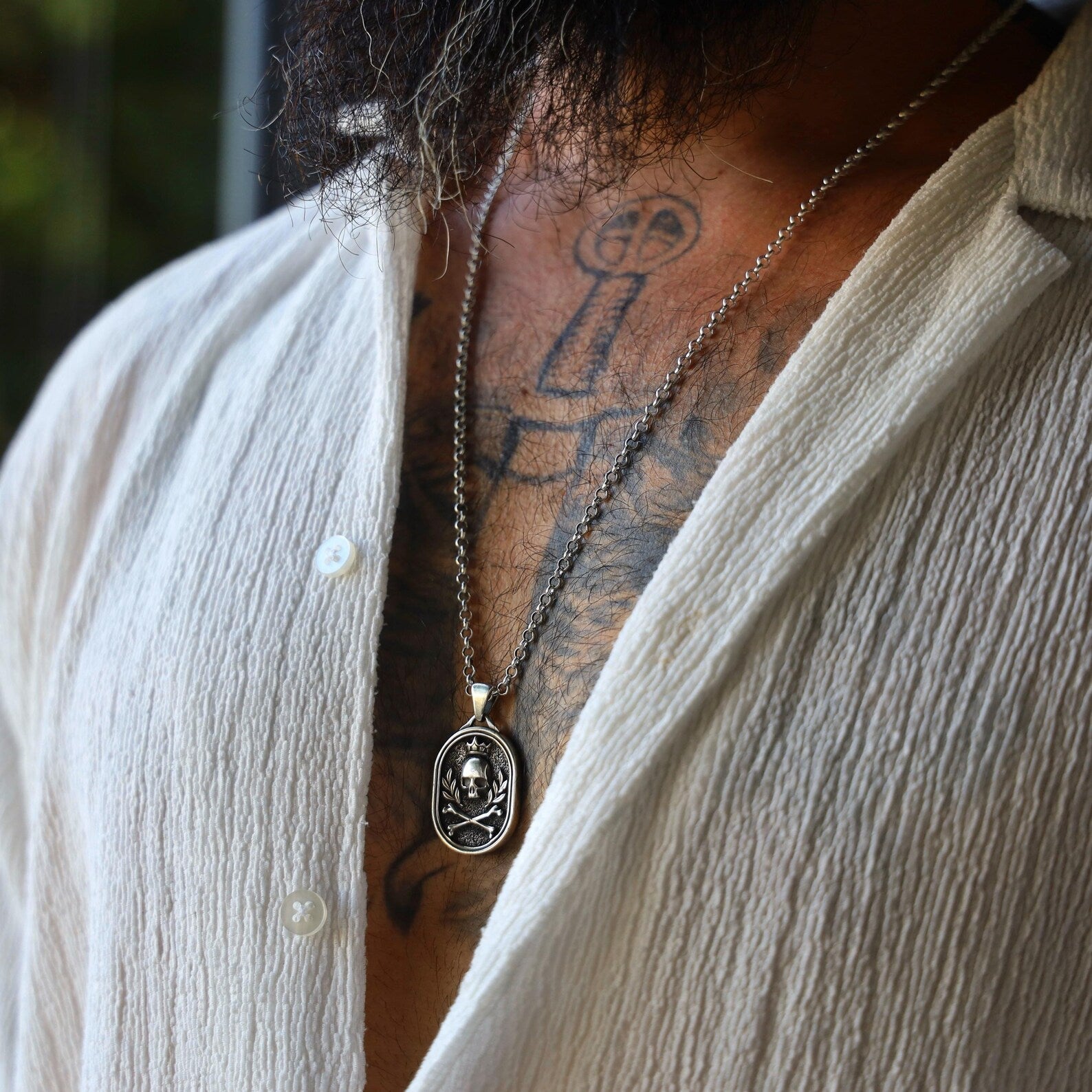 Men’s gothic pendant necklace made of solid sterling silver, showcasing a striking skull emblem under a royal crown, perfect for expressing individuality and alternative fashion style.