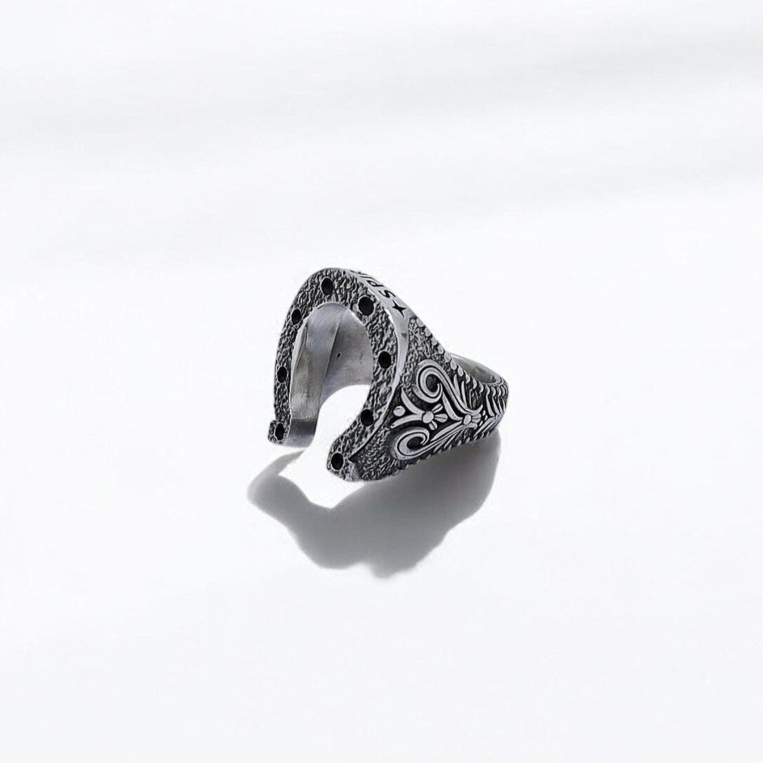 Handcrafted for the modern man, this silver horseshoe ring for men blends rugged charm with a symbol of luck. The horseshoe motif is intricately detailed in high-quality sterling silver, creating a unique statement ring that’s perfect for everyday wear or special occasions. A must-have accessory for men who appreciate timeless design and quality craftsmanship.