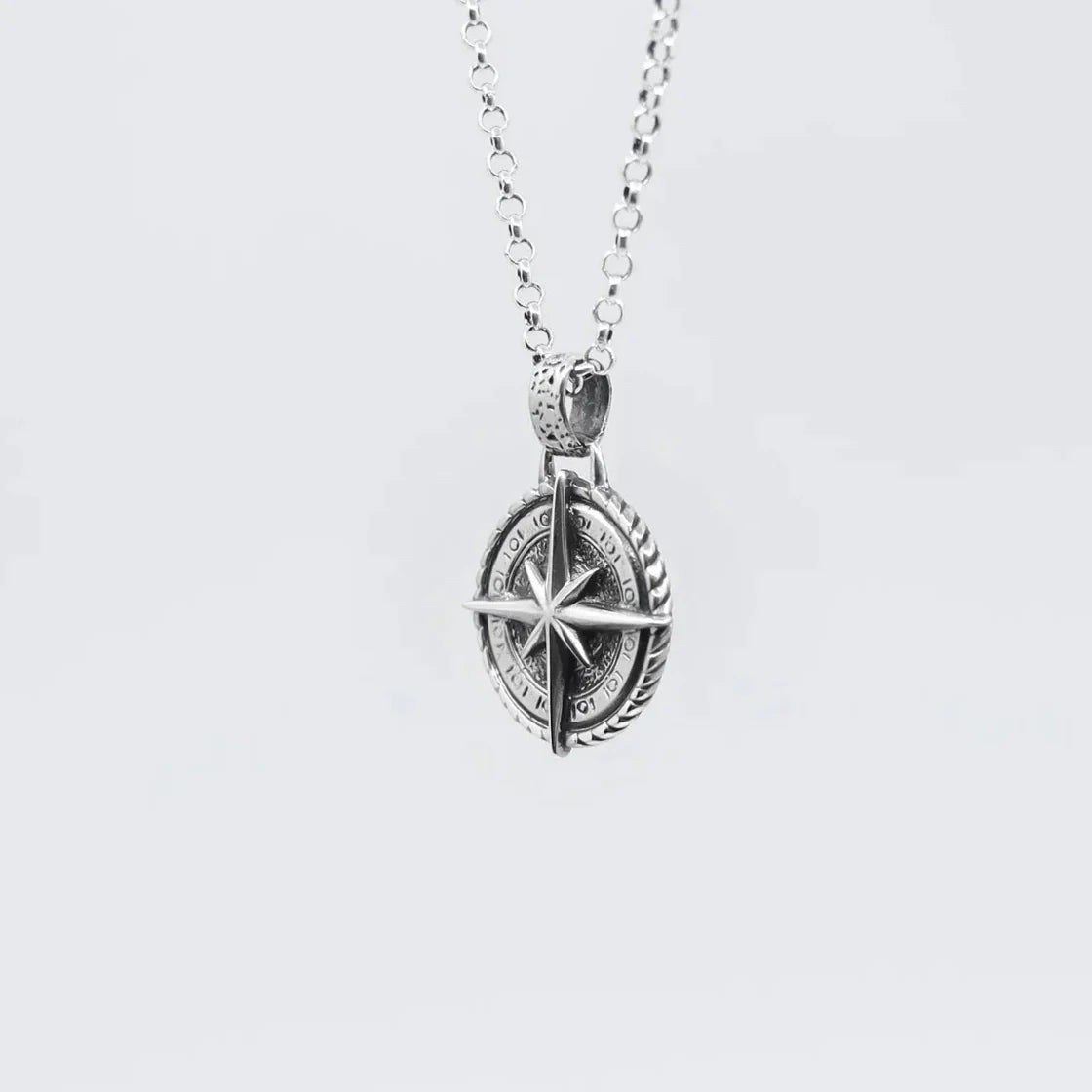 Elegant sterling silver compass pendant necklace designed for ocean lovers and seekers of adventure. This handcrafted nautical jewelry piece features a finely detailed north star compass symbol, representing direction, guidance, and personal journey. Perfect for men and women, this unisex necklace is an ideal accessory for everyday wear or special occasions. A popular Etsy gift idea for birthdays, anniversaries, and Father’s Day..