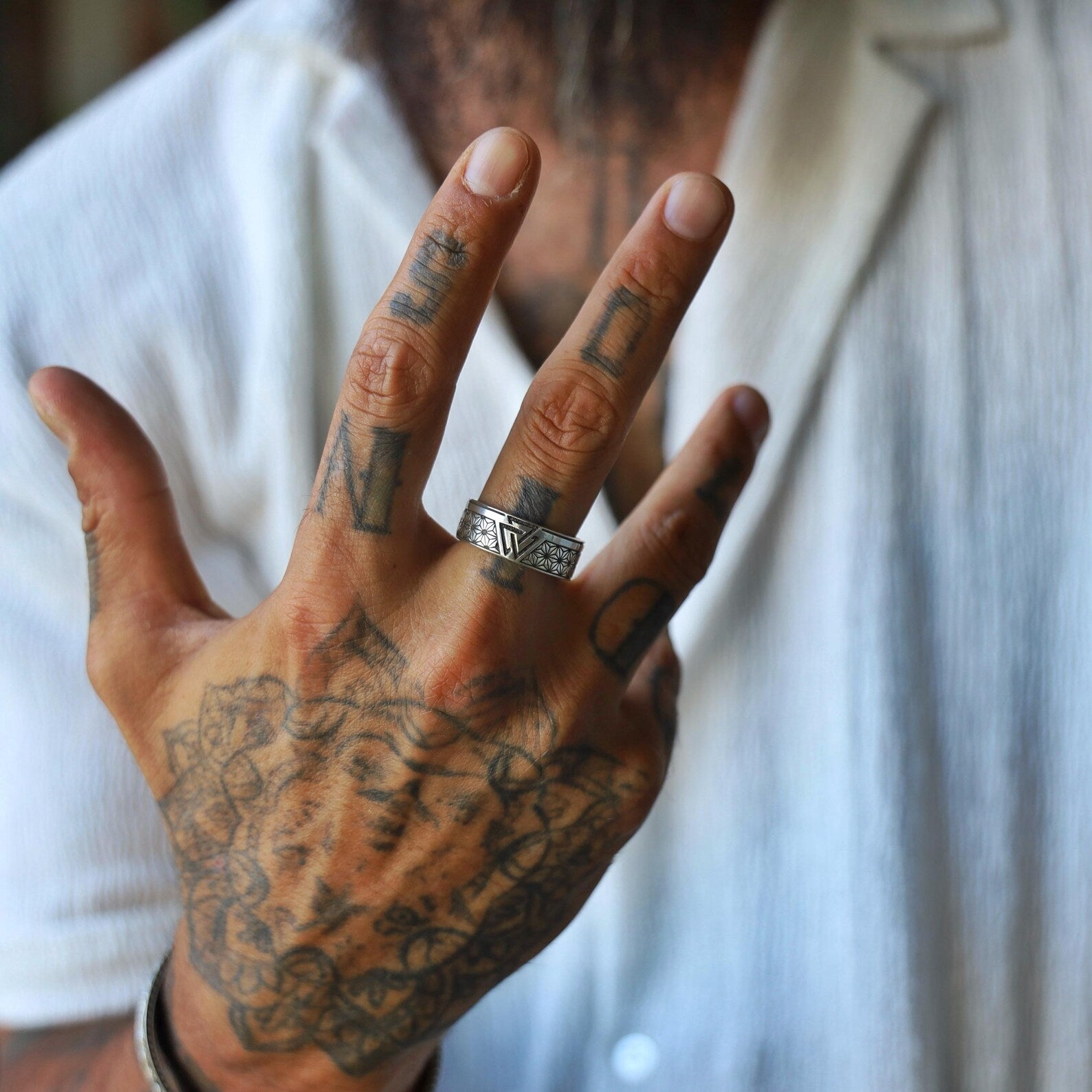 Sterling silver Norse Valknut ring designed for men who seek strength, honor, and spiritual protection. Featuring clean geometric lines and a timeless Nordic pattern, this Viking-style band is perfect for everyday wear or special occasions. A symbolic and powerful gift for him rooted in mythology and artisan detail.