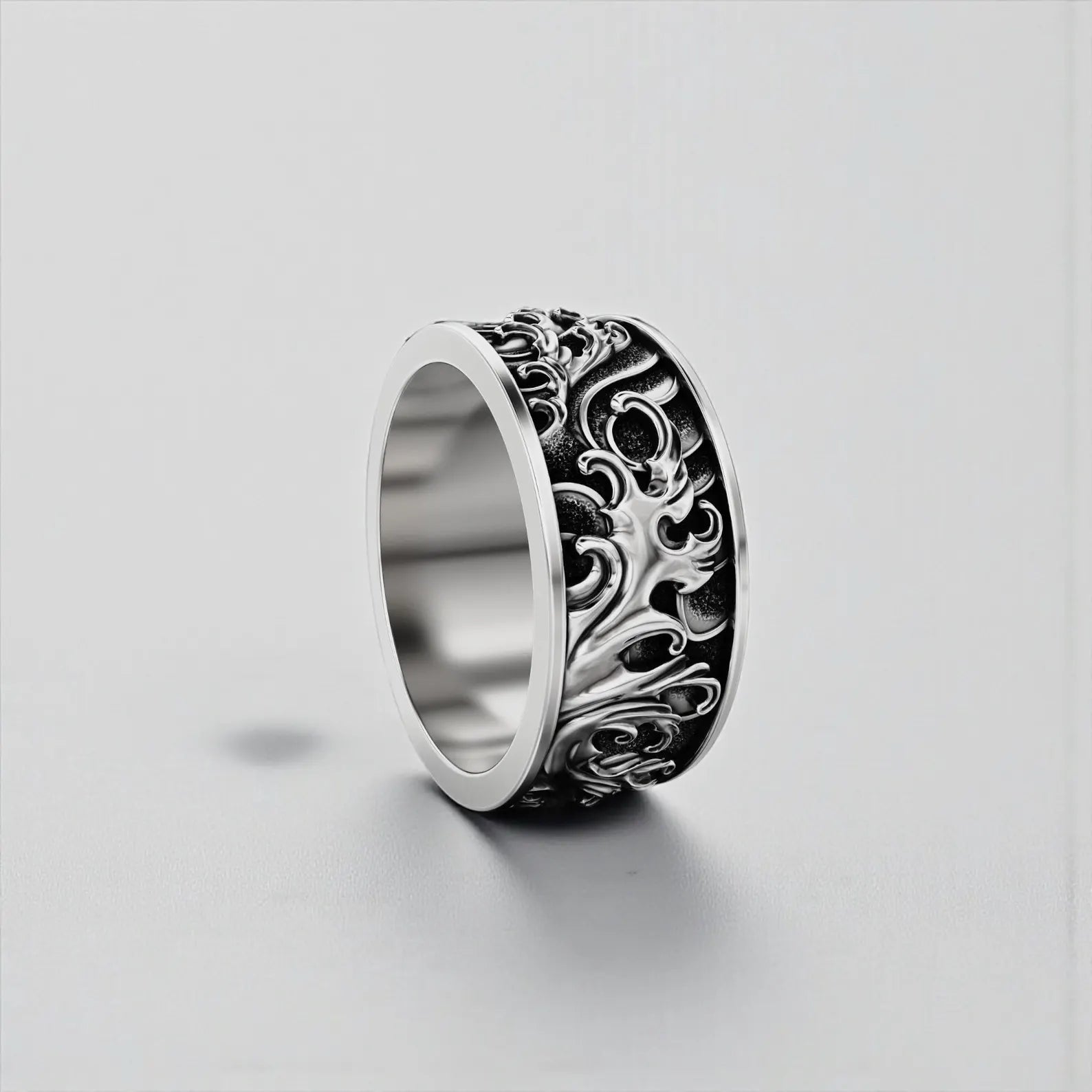 Sea inspired band ring for men made of 925 sterling silver with detailed ocean wave pattern