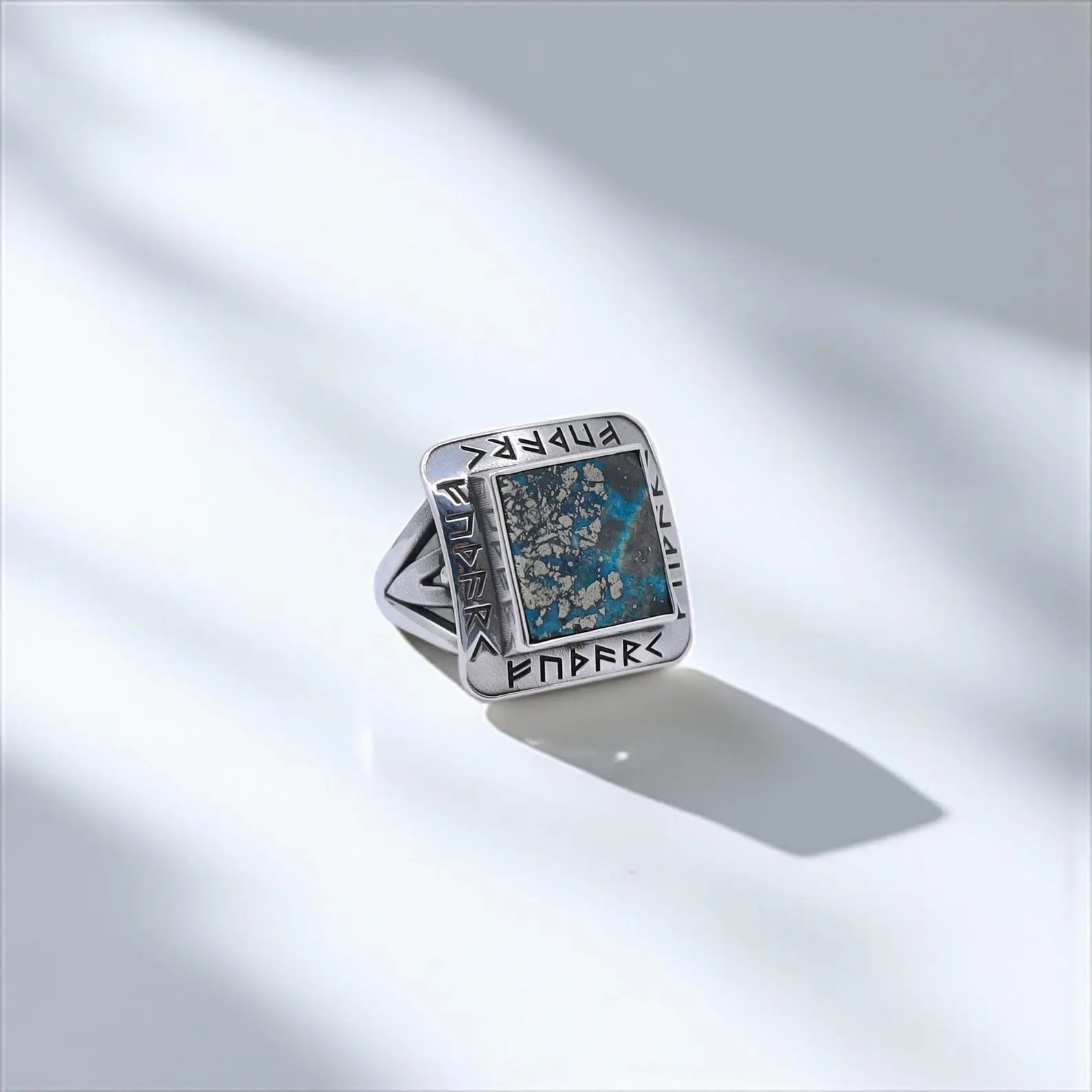 Handcrafted sterling silver Viking ring for men featuring a bold square-cut turquoise stone and ancient runic inscriptions. This unique Nordic ring blends mythological design with modern masculinity. Perfect as a birthday or anniversary gift for him. Ideal for Pinterest boards and Shopify Viking collections.