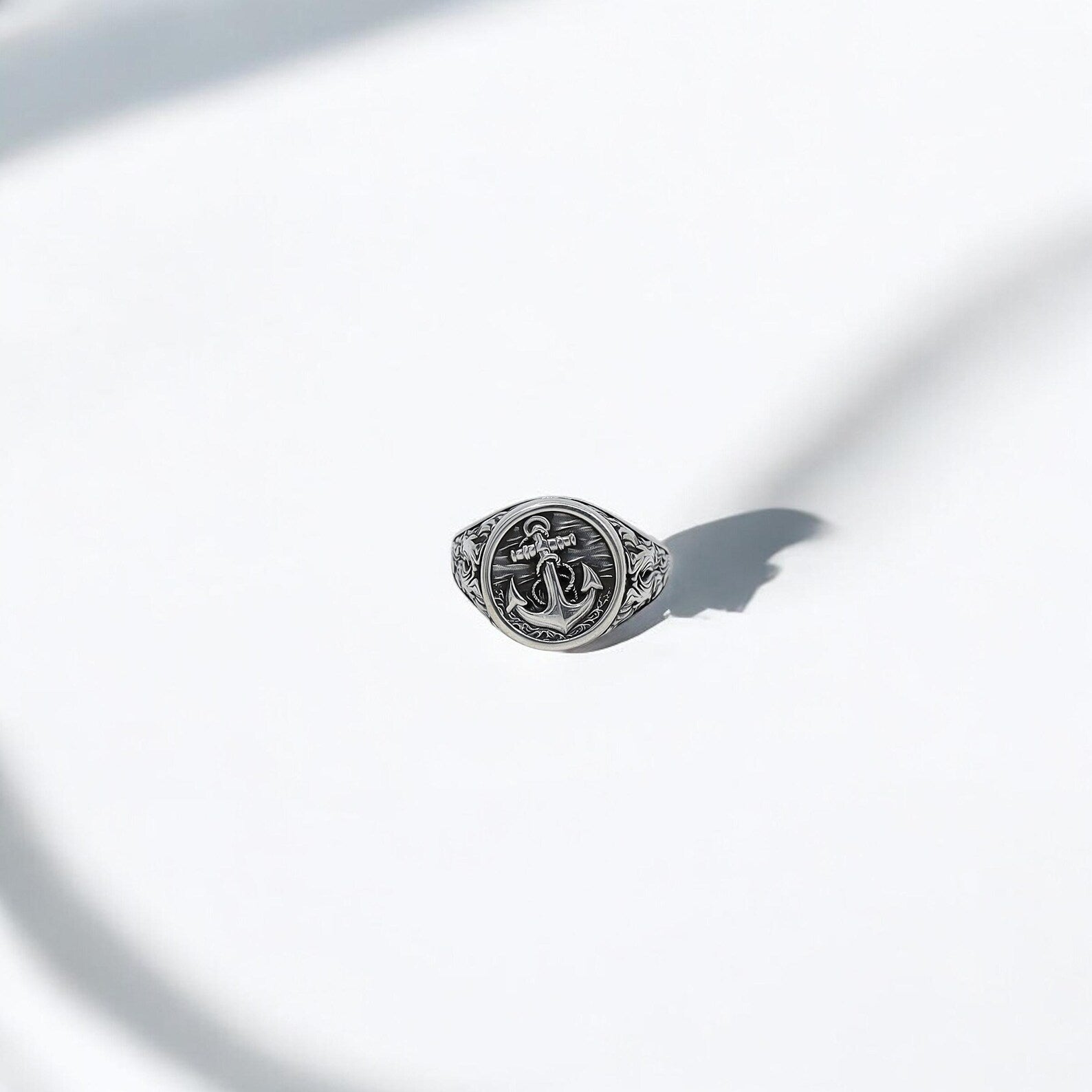 Nautical-inspired silver ring featuring an anchor emblem that celebrates maritime tradition. This sailor jewelry gift for men is ideal for commemorating special moments like Father's Day or anniversaries with meaningful style.