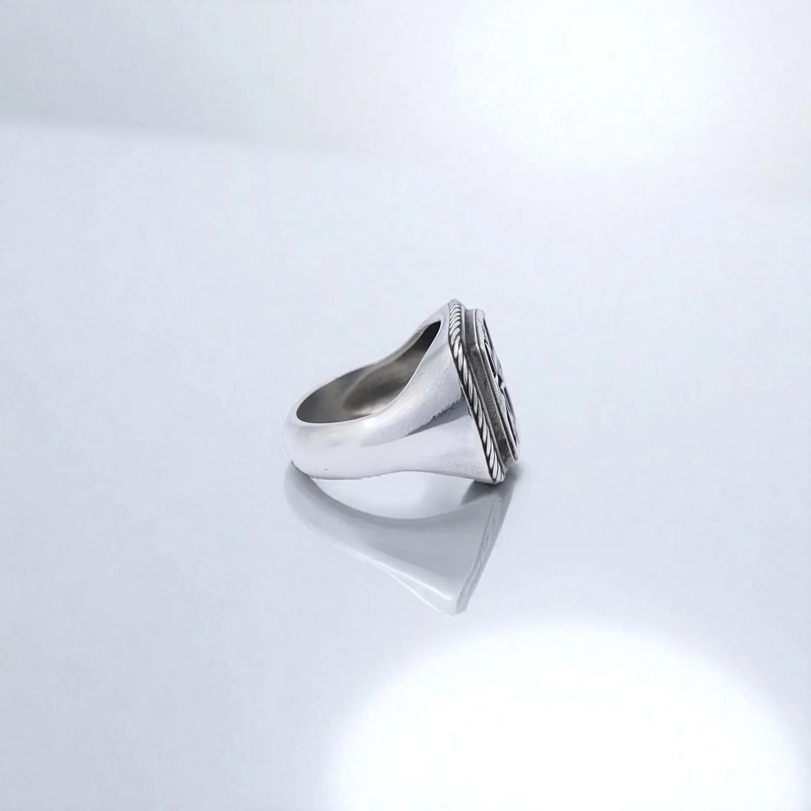 Personalized silver signet ring with a gothic cross symbol, perfect for spiritual men who appreciate religious jewelry with a minimalist yet powerful presence.