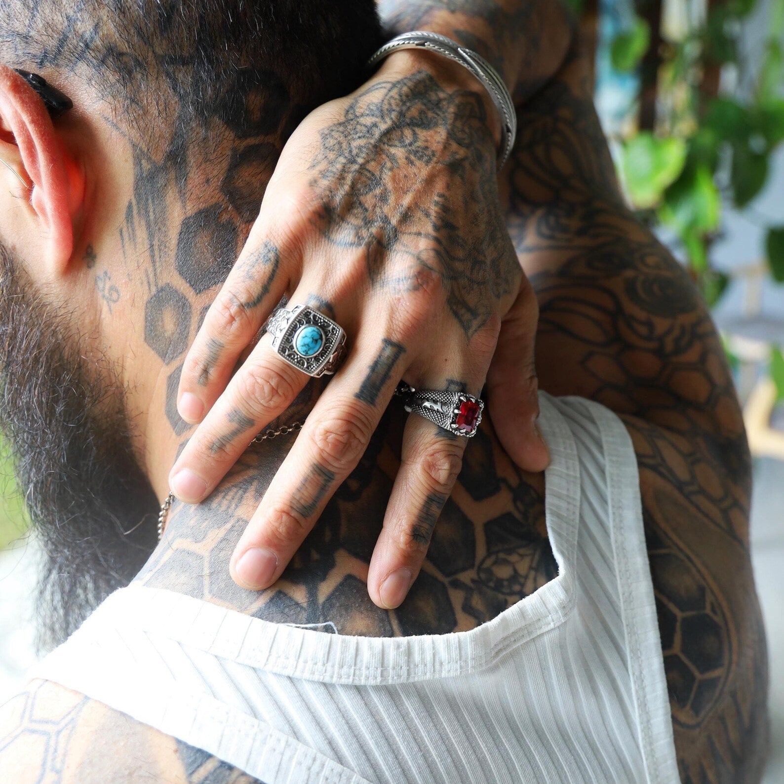 Styled on the finger, this minimalist sterling silver ring with emerald cut ruby zircon adds an instant touch of luxury and color to any outfit. Handcrafted with care and designed for both men and women, this elegant claw ring transitions seamlessly from everyday wear to special occasions, making it a versatile piece for modern jewelry lovers.