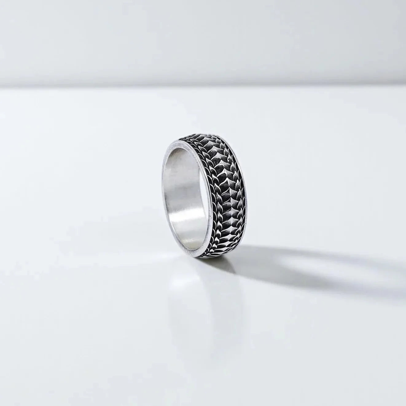 Minimalist band ring handcrafted in solid sterling silver with a textured gothic pattern. This men's wedding band blends timeless design with bold detailing, perfect for daily wear or as a unique gift for him. Ideal for Shopify listings, Google image search, and Pinterest men’s jewelry boards.