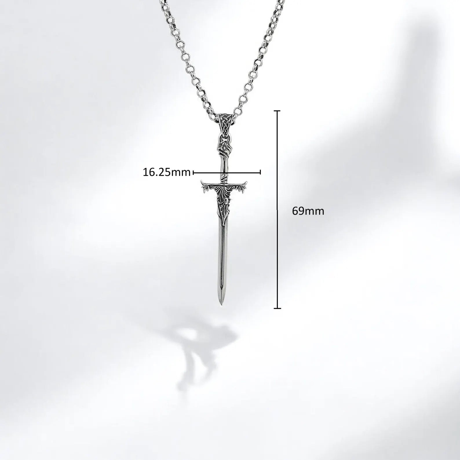 A unique artisan-crafted necklace made for men who resonate with the energy of warriors, gothic mystique, and fantasy narratives. This silver sword pendant, forged from sterling silver and finished with oxidized detailing, is not only a piece of jewelry—it is a personal talisman of strength, clarity, and resilience.