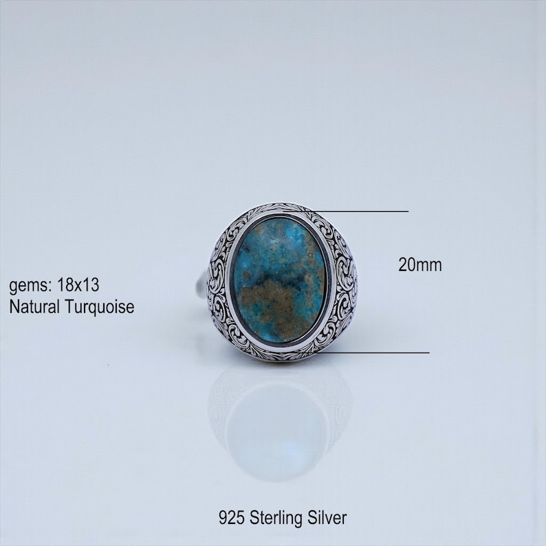 Detailed engraving close-up of a Baroque floral signet ring for men, highlighting handcrafted silver textures and oxidized finish for depth and contrast