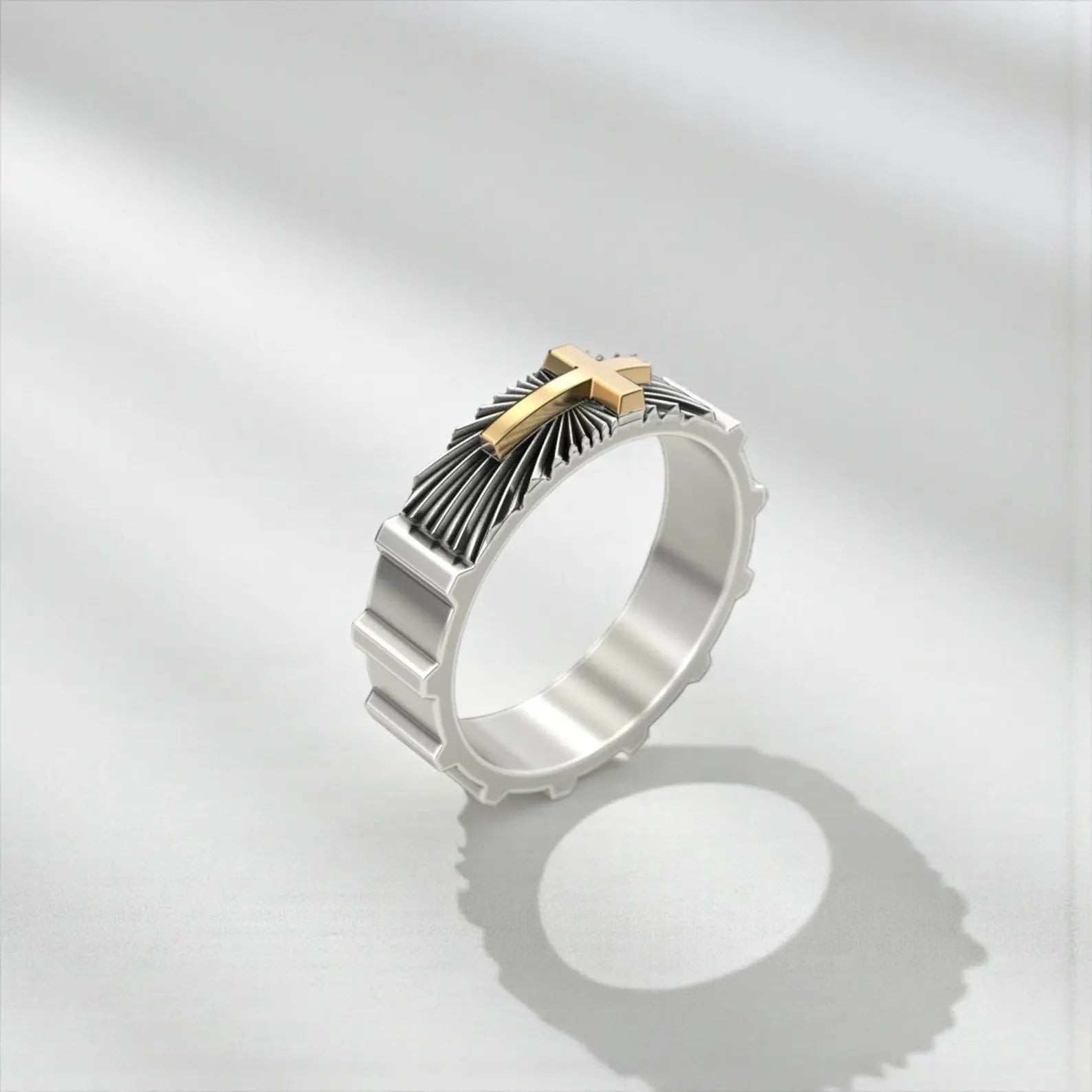 Handmade silver band ring with gold cross symbol, representing commitment, belief, and spiritual strength in a timeless design