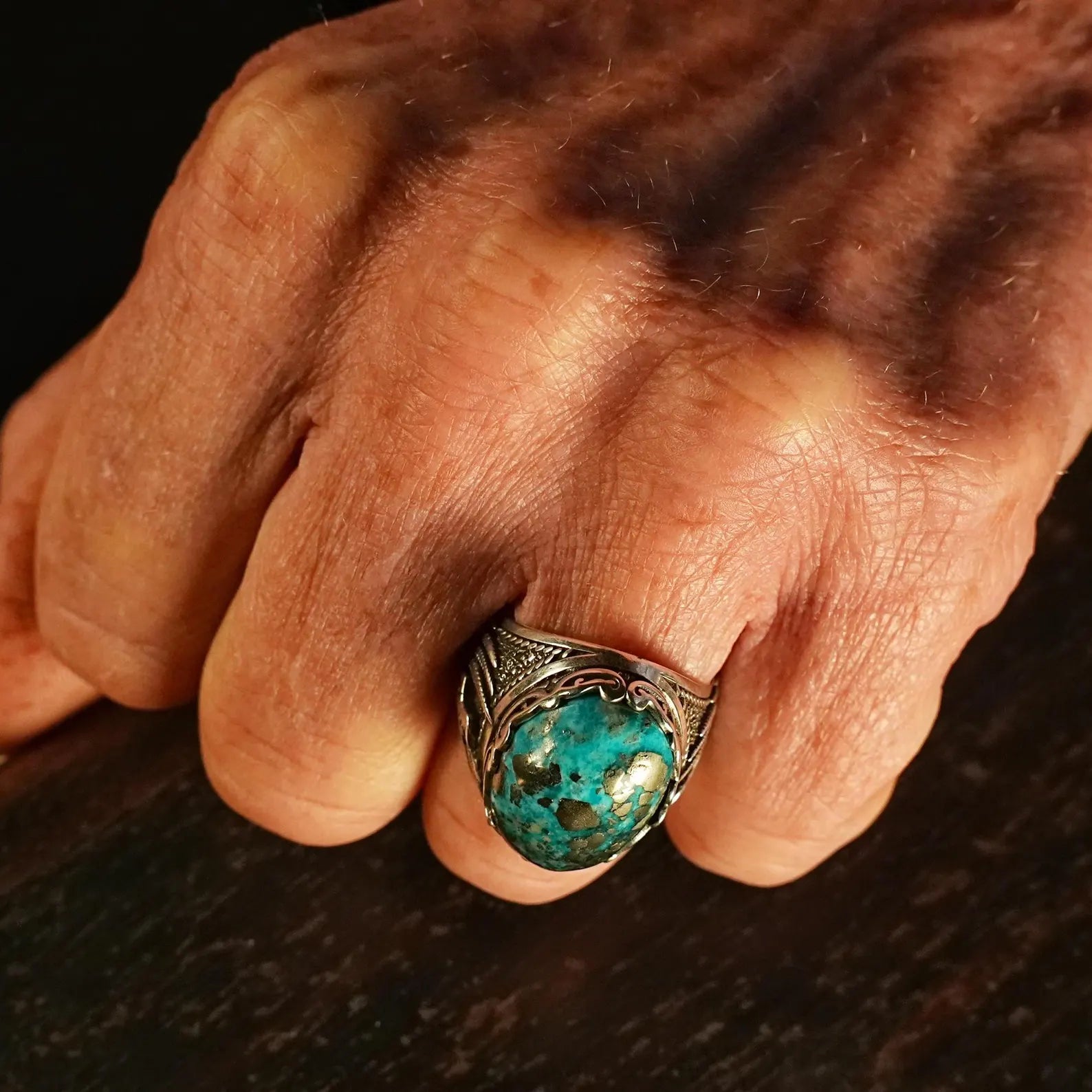 Celebrate your unique style with this handcrafted sterling silver ring, featuring a vibrant turquoise birthstone and gothic wing accents. This statement piece blends mystical elegance with rugged biker vibes, perfect for Western style lovers and Harley Davidson fans.