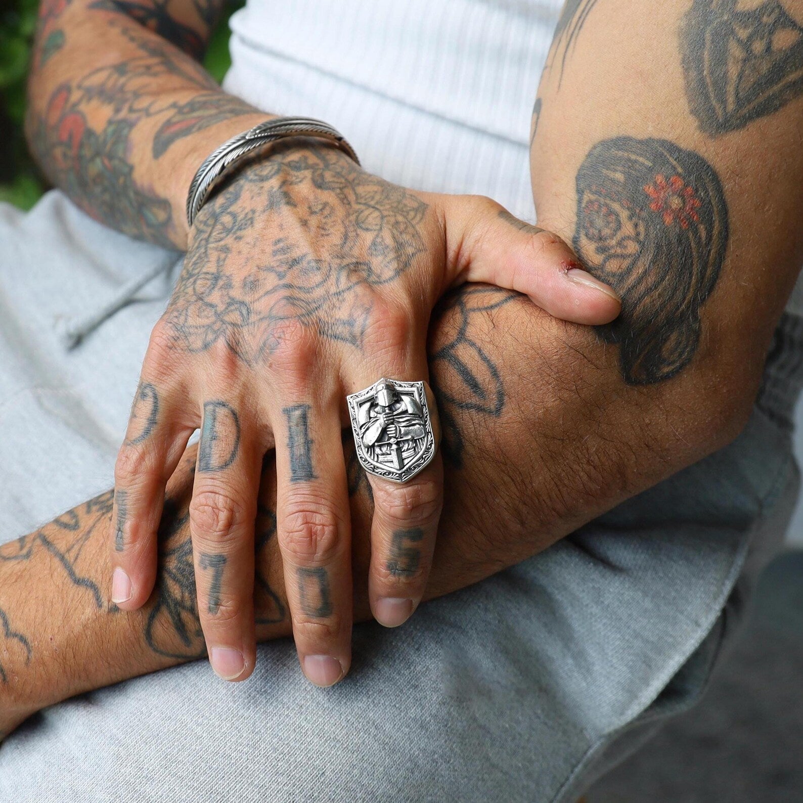 Unique warrior statement ring made from sterling silver with medieval armor detailing. A perfect accessory for fantasy lovers and modern-day heroes seeking a gothic and masculine edge in their jewelry collection.