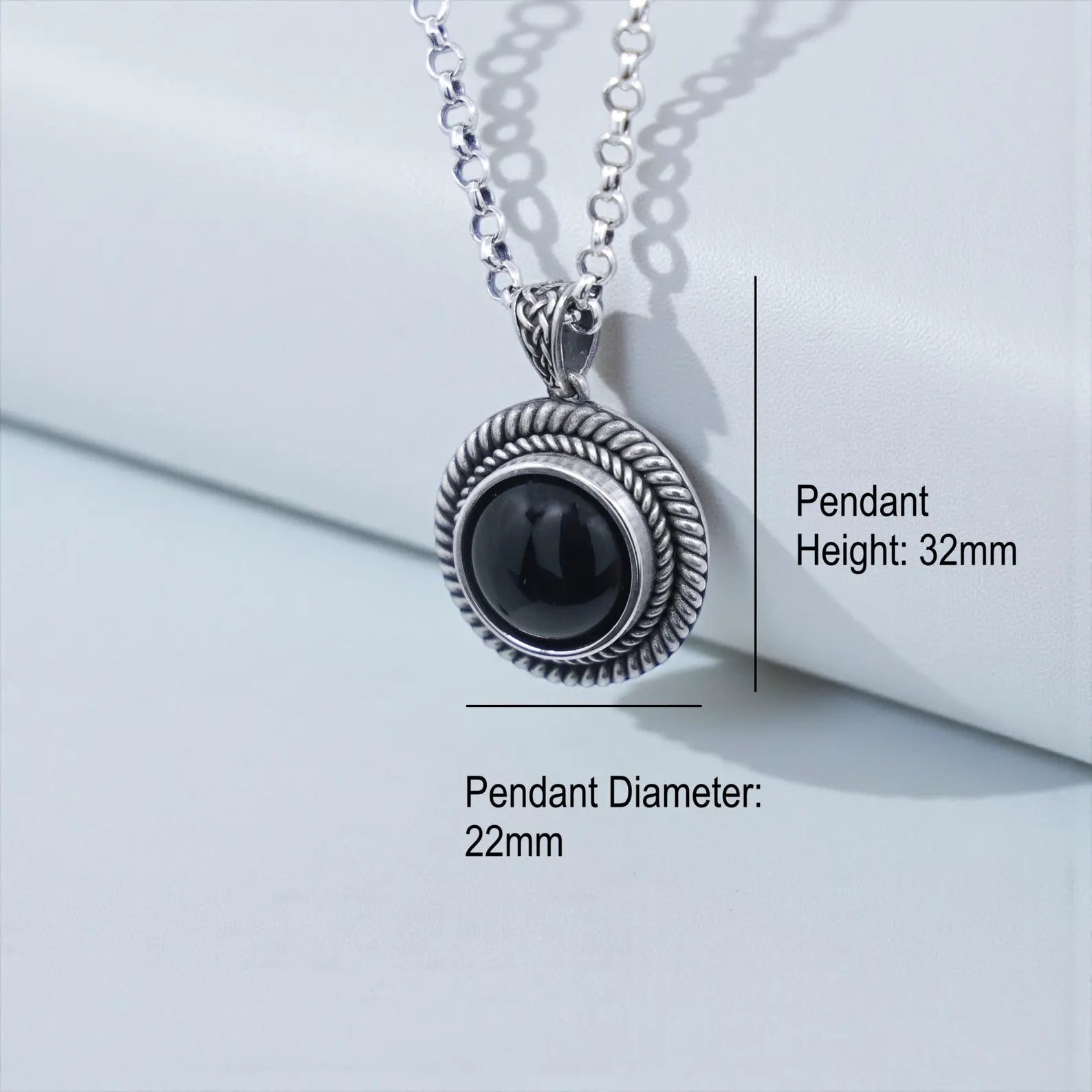 Oxidized and hand-polished sterling silver rope pendant for men featuring a deep black onyx gemstone, offering a blend of timeless vintage style and bold statement fashion ideal for anniversary or birthday gifting.