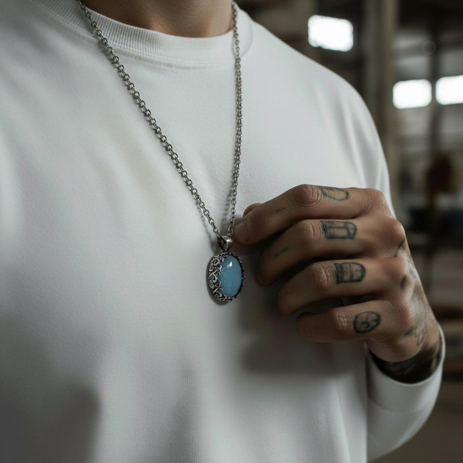 Unique aquamarine gemstone necklace for men, handcrafted with a vintage sterling silver floral frame that enhances the soft blue radiance of the aquamarine birthstone, perfect for gift-giving on special occasions.