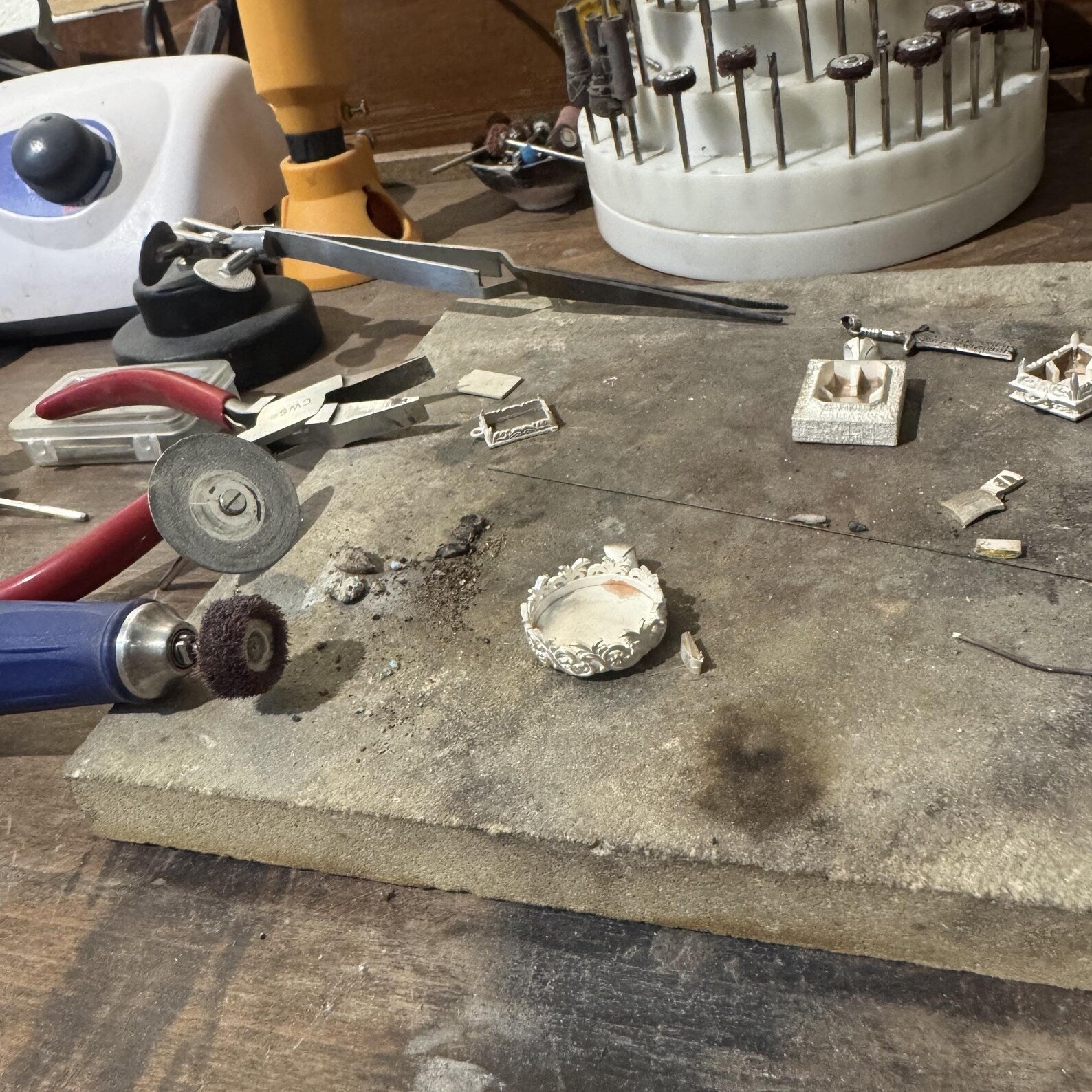 Vintage round turquoise pendant in handcrafted sterling silver featuring elaborate baroque leaf patterns and a hand-polished blue stone with natural matrix; a meaningful necklace representing luck, grounding, and spiritual wisdom, designed especially for men who value detailed, artisan-made gemstone jewelry.