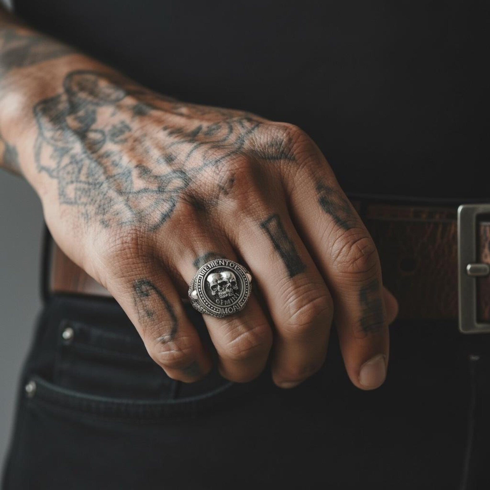 Luxury sterling silver men’s ring with a detailed Gemini twin-skull motif inspired by Memento Mori philosophy, showcasing gothic artistry, symbolic zodiac elements, and master-level silversmithing in a durable, hypoallergenic handcrafted design.