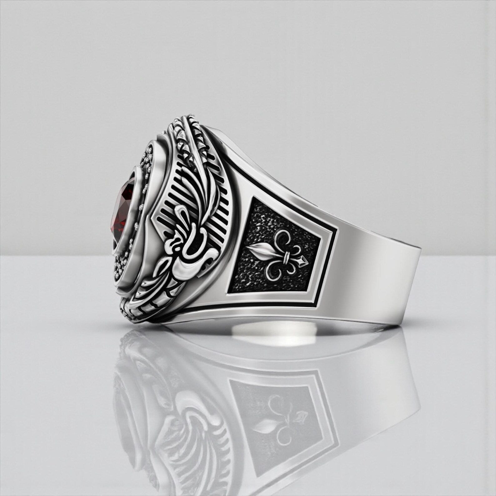 Luxury gothic snake ring for men made of 925 sterling silver, featuring a central red garnet CZ stone, perfect as a personalized anniversary or birthday gift for him.