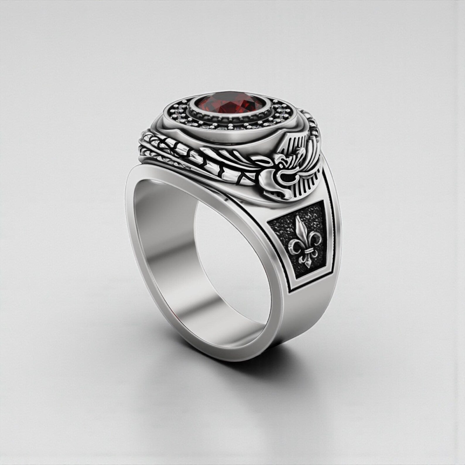 Symbolic serpent ring with red garnet gemstone, crafted as a statement piece in solid sterling silver, inspired by mythological and esoteric Ouroboros symbolism.