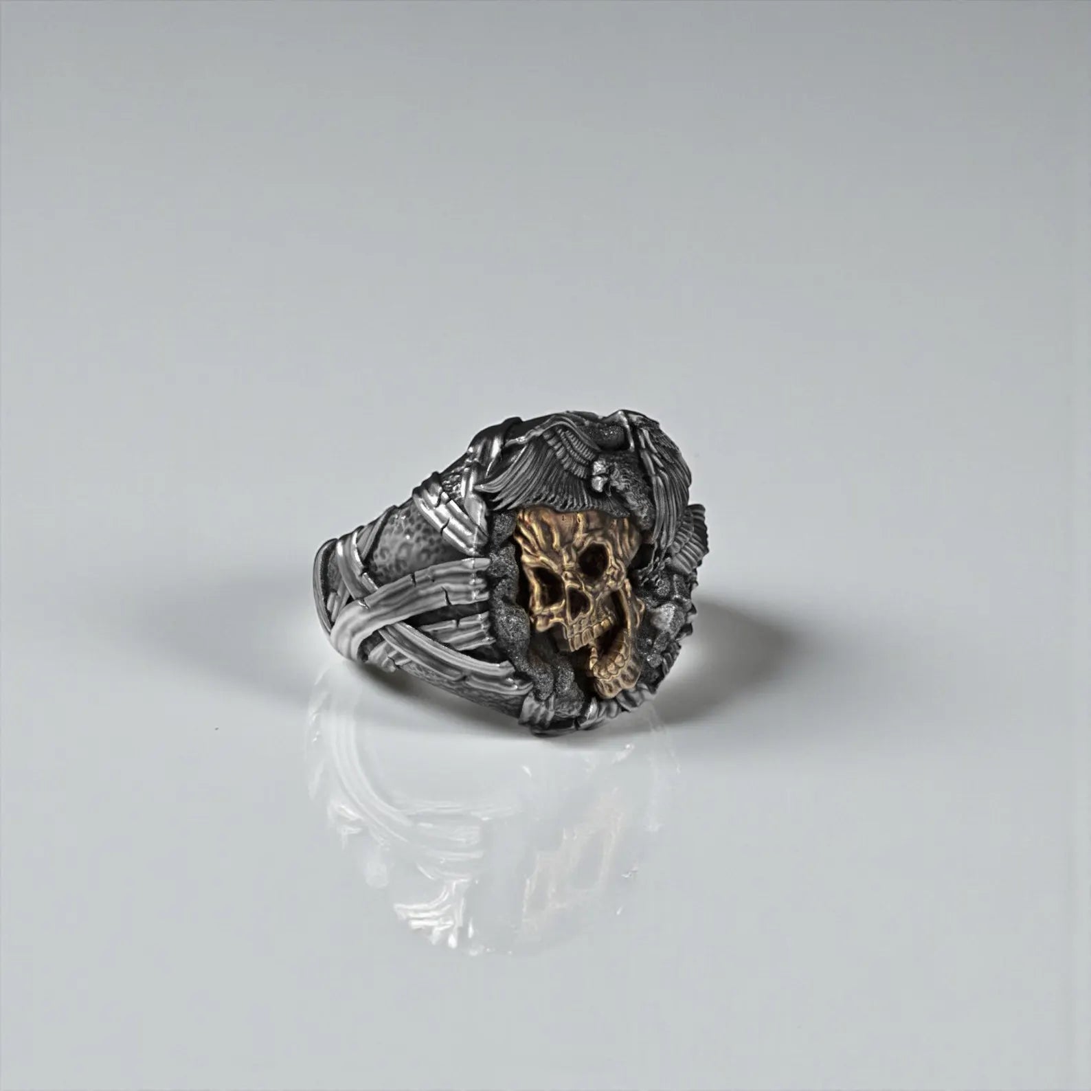 Gothic biker ring crafted from solid sterling silver, showcasing a skull and eagle motif inspired by Memento Mori philosophy and timeless masculine power.