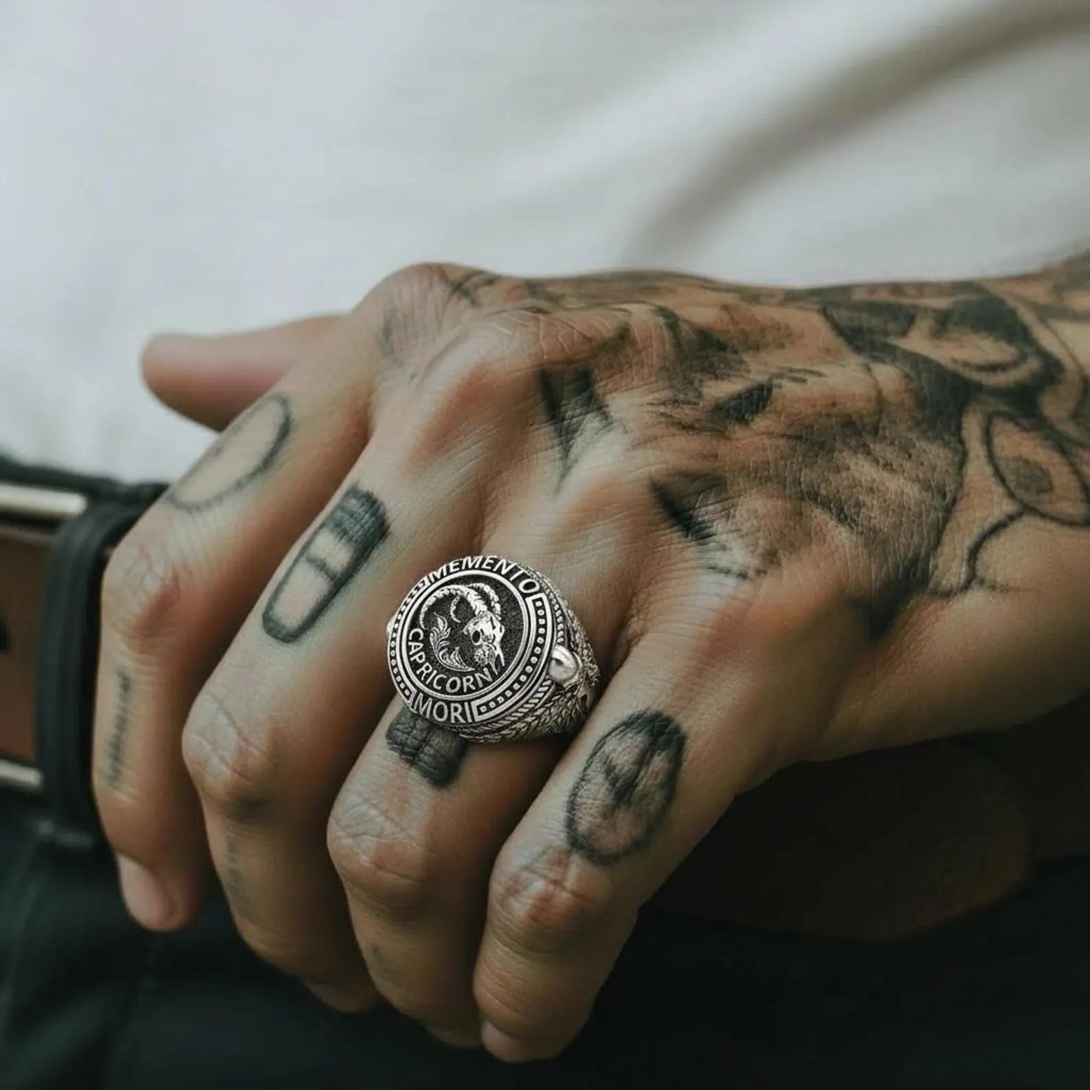 Handcrafted Capricorn zodiac skull ring in sterling silver, representing resilience, mortality, wisdom, and unwavering intention through gothic symbolism.