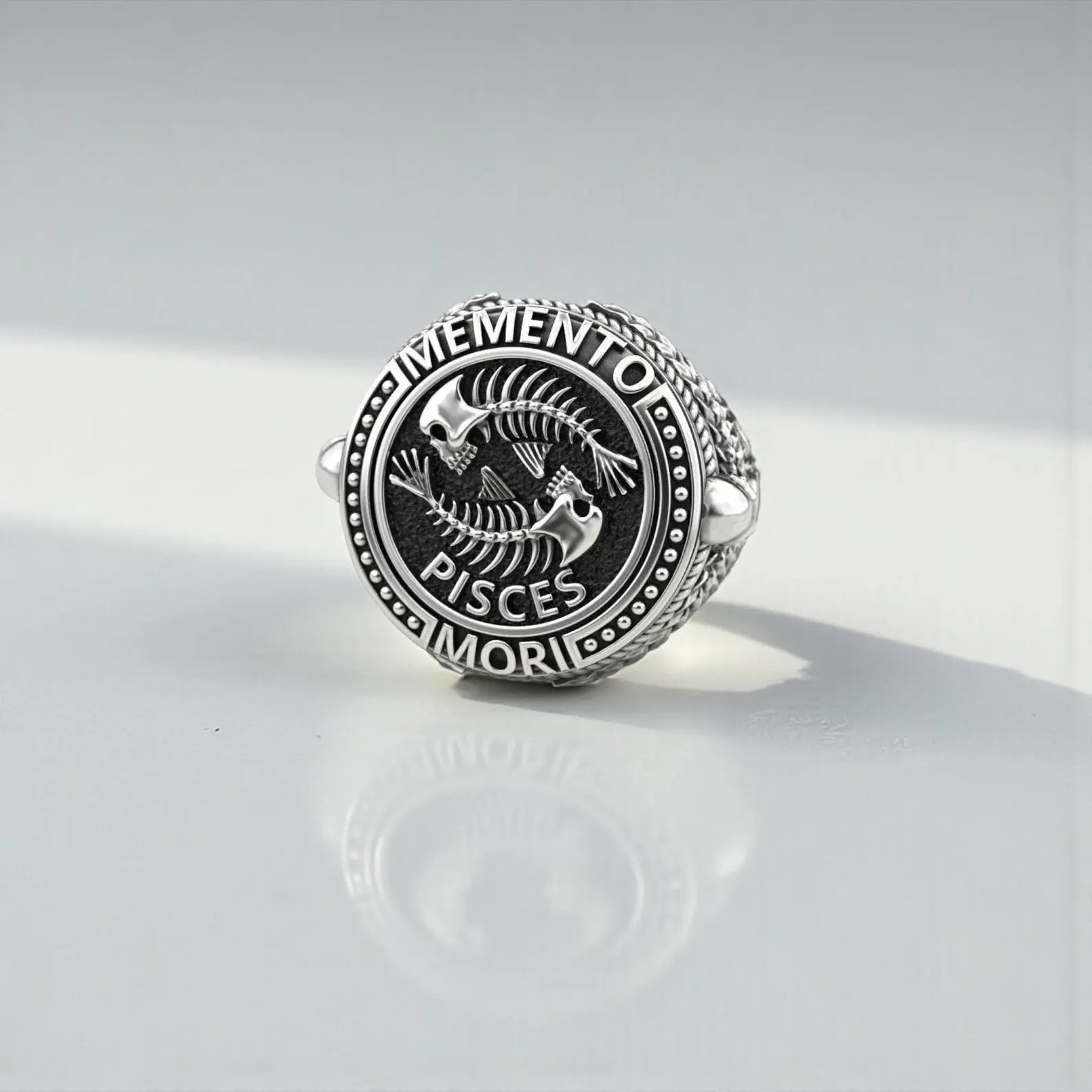 Handcrafted Memento Mori Pisces ring made from premium 925 sterling silver, featuring a detailed fish skeleton design that blends gothic symbolism with Pisces zodiac meaning for collectors and astrology enthusiasts.