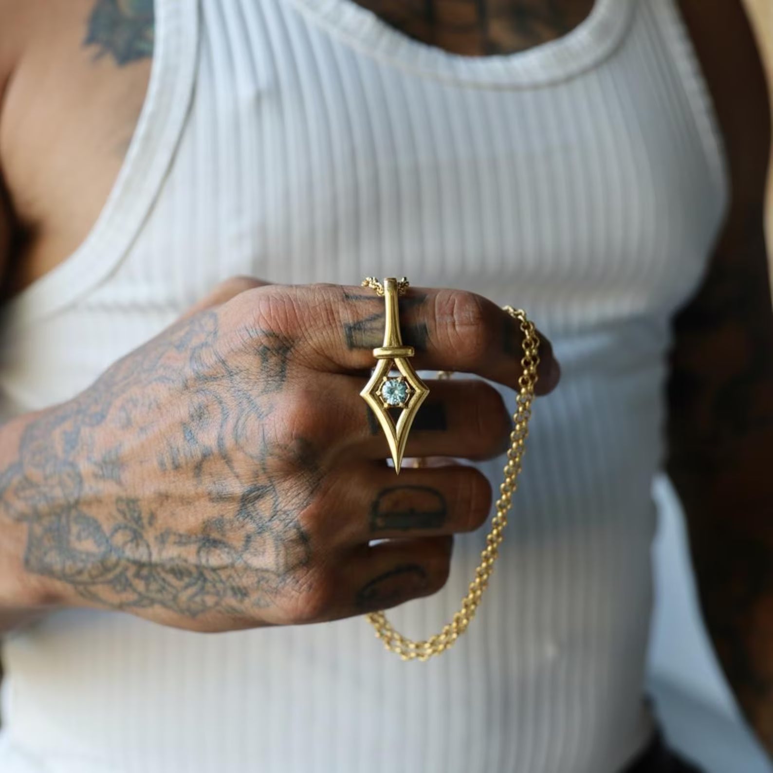 Modern minimalist aquamarine gemstone pendant necklace crafted with precision, featuring a polished 18K gold plated finish over solid sterling silver