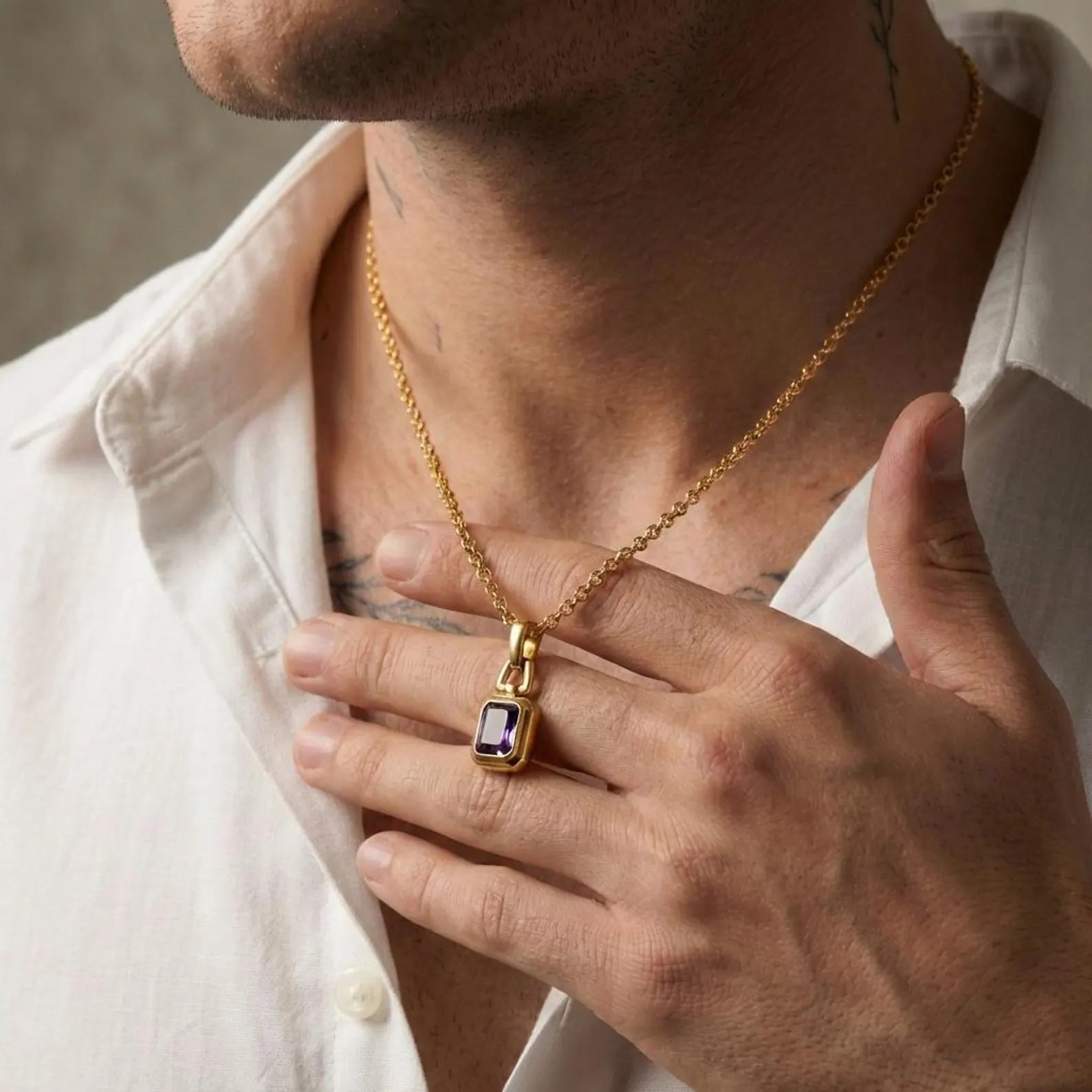 High-quality luxury amethyst gemstone necklace featuring a 10x8 oval CZ amethyst set in an 18k gold plated sterling silver pendant, styled as a modern statement birthstone jewelry piece