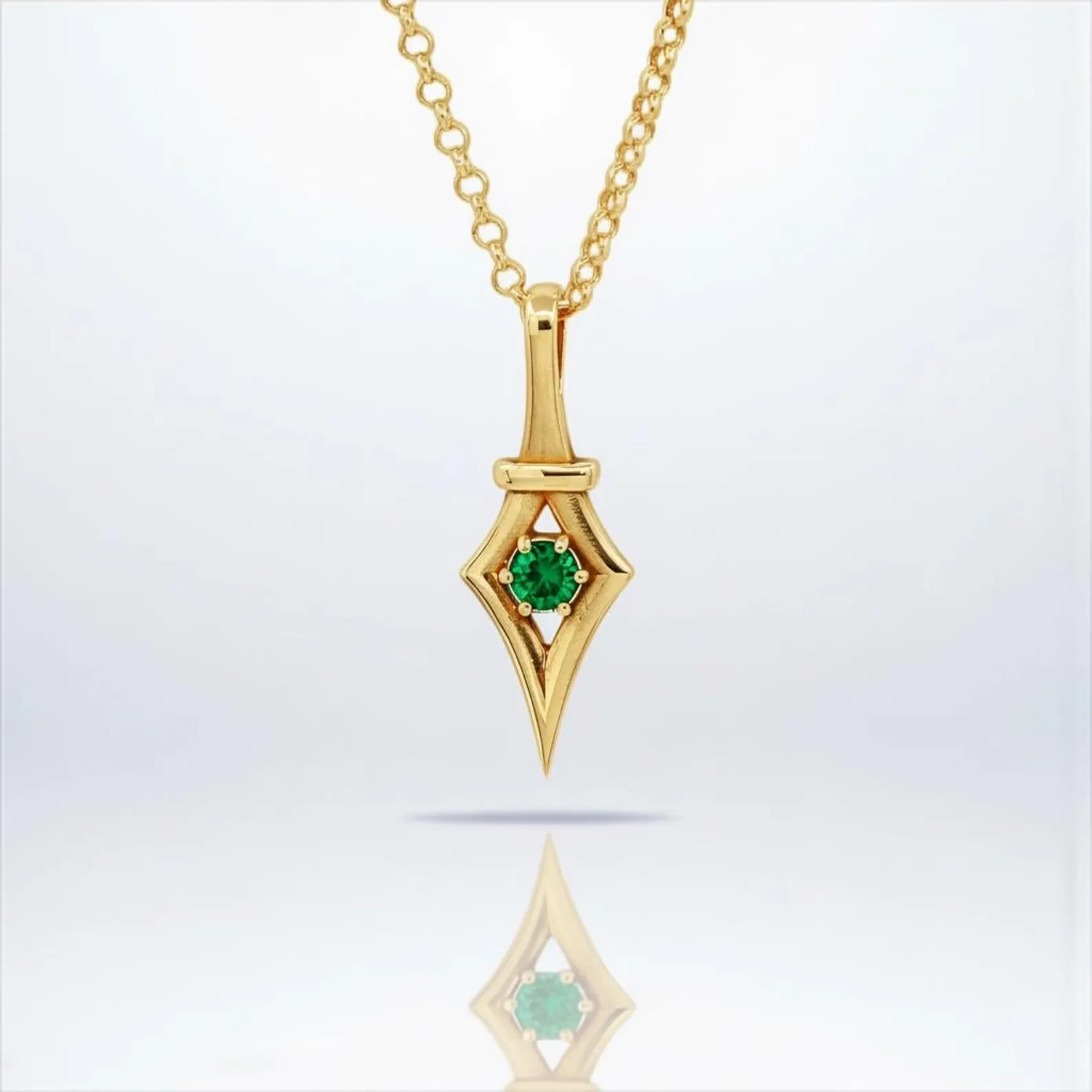 Victorian gothic emerald pendant necklace crafted from 18K gold plated 925 sterling silver featuring a rich green emerald birthstone in vintage inspired design