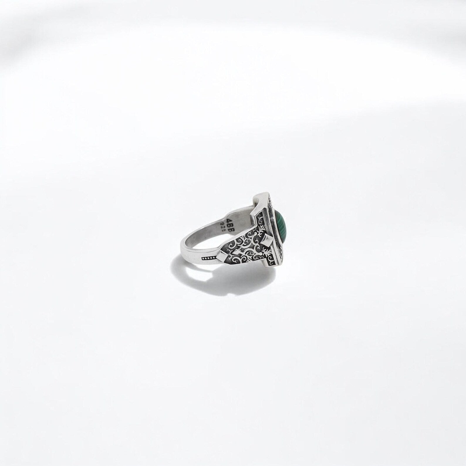 This striking 925K silver malachite ring for men is the perfect balance of power and elegance. With intricate gothic engraving on all sides and a vibrant green malachite gemstone at its center, this signet-style ring evokes ancient royalty, warrior spirit, and bohemian mysticism. Its handcrafted detailing, oxidized texture, and symbolic gemstone make it a standout piece—ideal for gifting on Father’s Day, a birthday, or an anniversary.