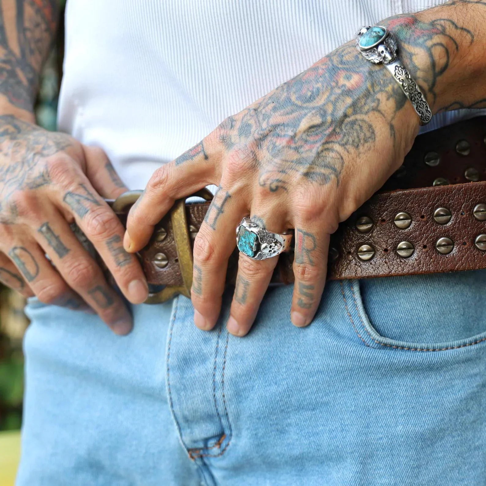 Make a bold statement with this gothic skull and turquoise ring for men, meticulously handmade with oxidized sterling silver. The unique structure of the ring blends biker charm with mystical symbolism, creating a piece of jewelry that’s as meaningful as it is eye-catching. Perfect for birthdays, anniversaries, or Father’s Day, this turquoise ring is designed for men with fearless spirit and uncompromising style.