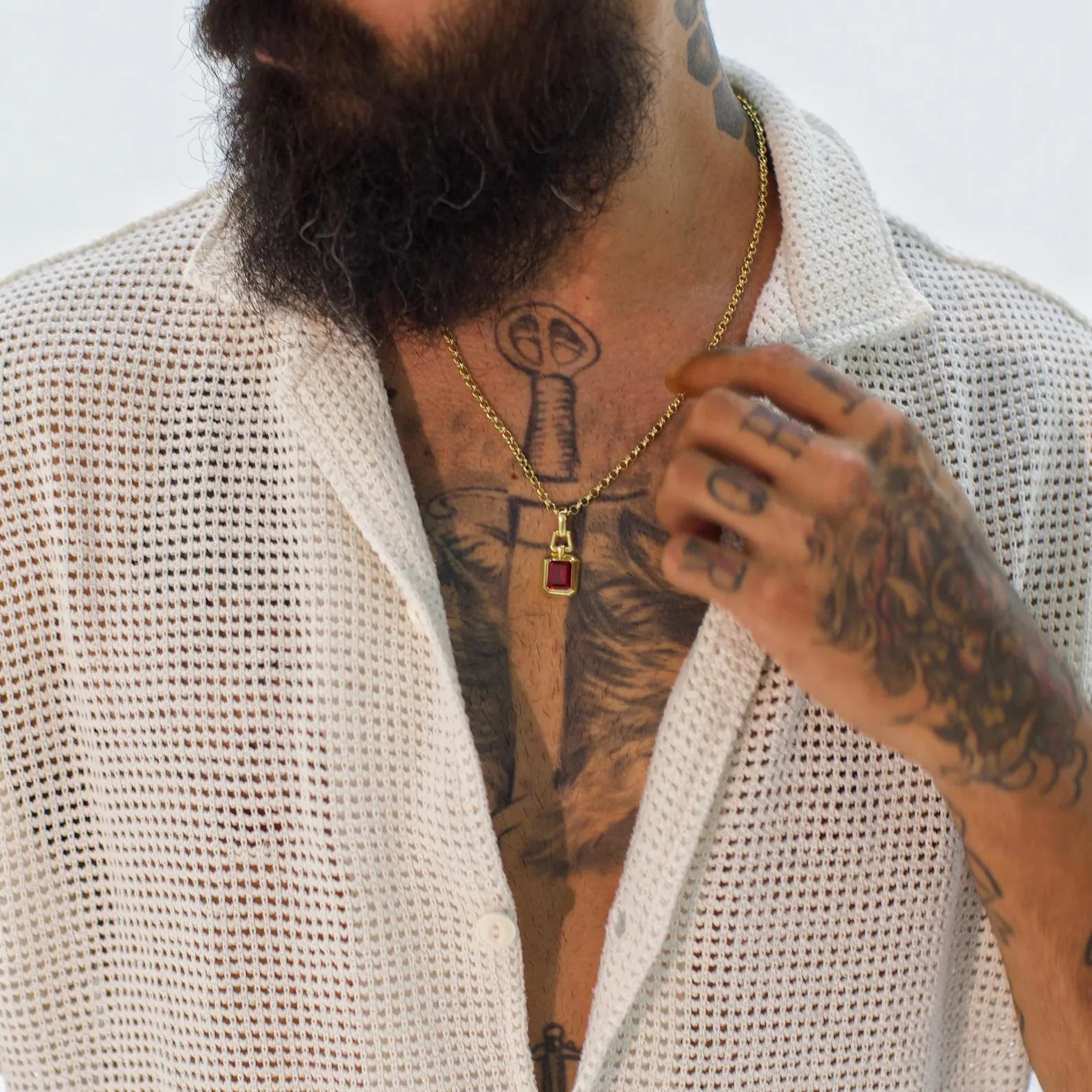 Elegant gold-plated ruby and emerald pendant necklace, designed to celebrate life’s milestones with symbolic depth. This handcrafted piece blends timeless design with modern craftsmanship—making it a meaningful birthday, Father’s Day, or graduation gift for your husband, boyfriend, or dad. A unique birthstone necklace that reflects style, culture, and purpose.