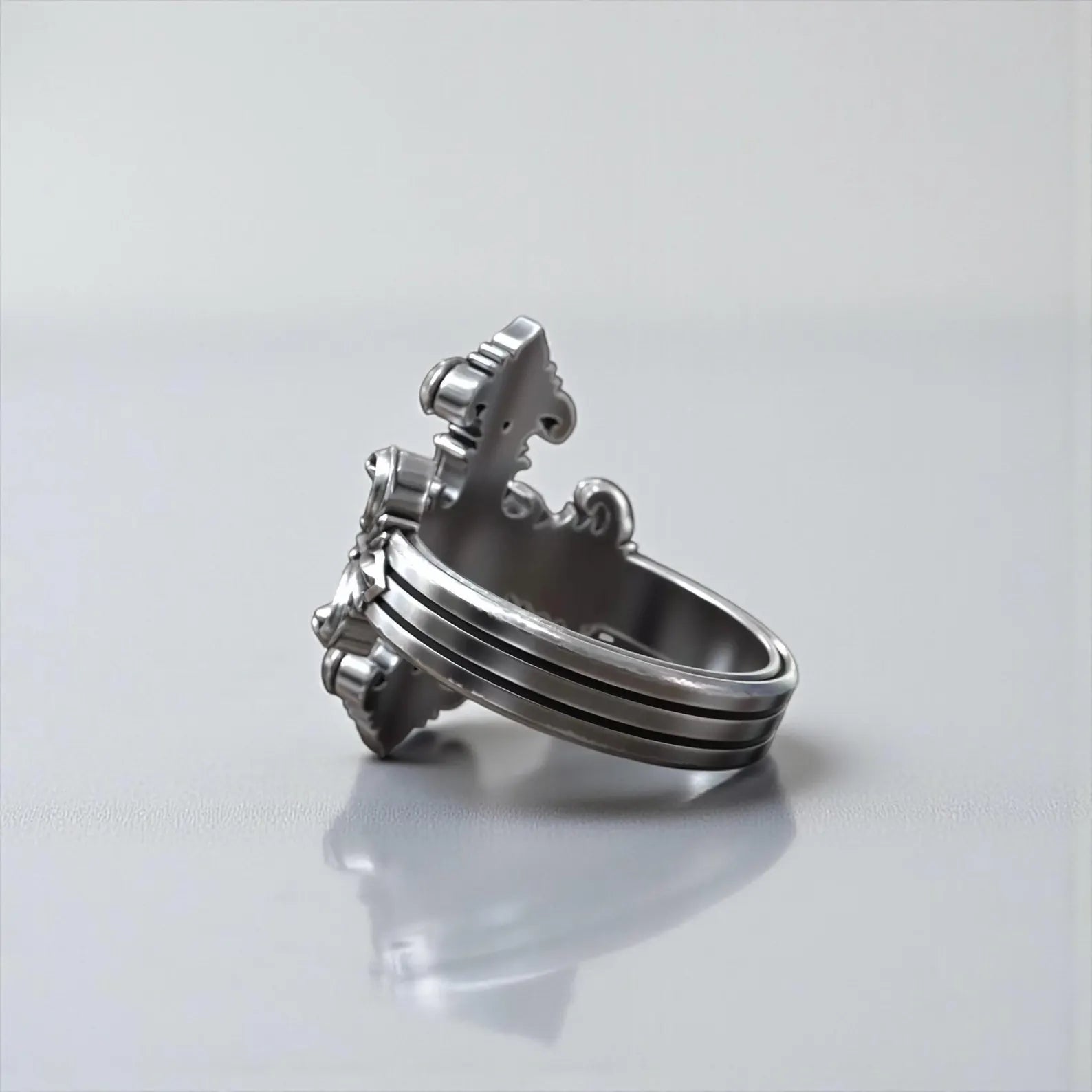 Handcrafted men’s baroque cross ring made from solid sterling silver with engraved religious motifs and oxidized contrast