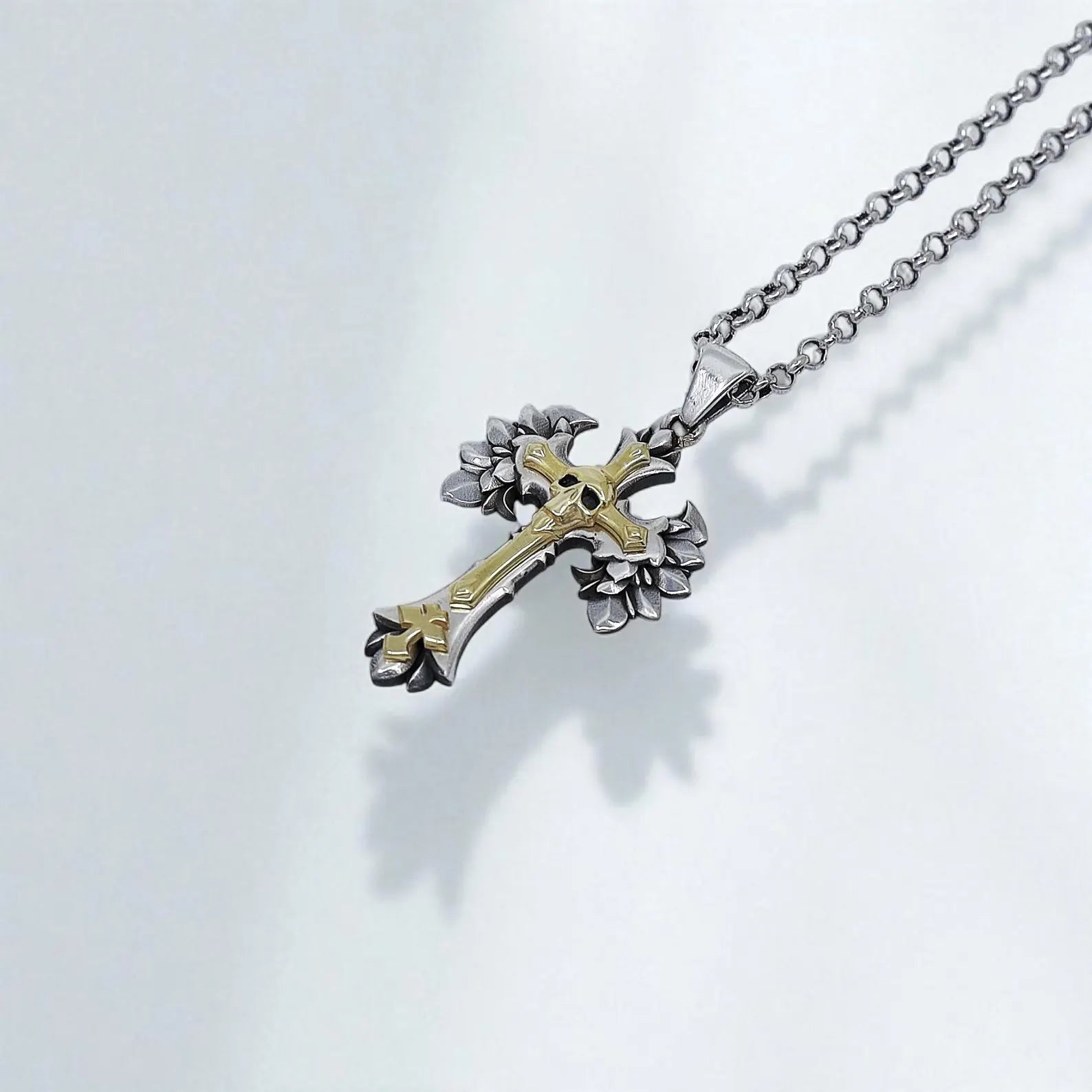 This Gothic Skull Cross Necklace embodies the spirit of rebellion and timeless elegance. Made of solid sterling silver with radiant gold-plated highlights, it features a 3D sculpted skull embedded in a symbolic cross design. Ideal for men or women who appreciate handcrafted, spiritual, and edgy jewelry.