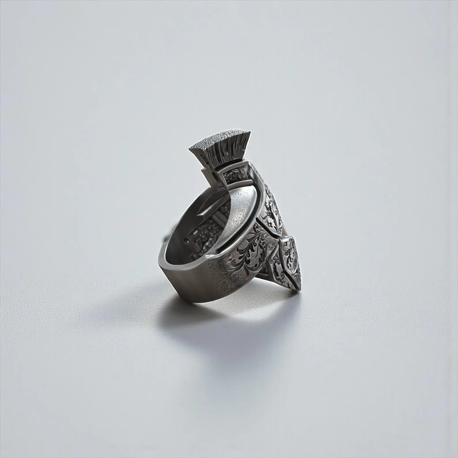 Solid 925 silver warrior jewelry piece with Baroque ornamental carvings and bold architectural ring proportions