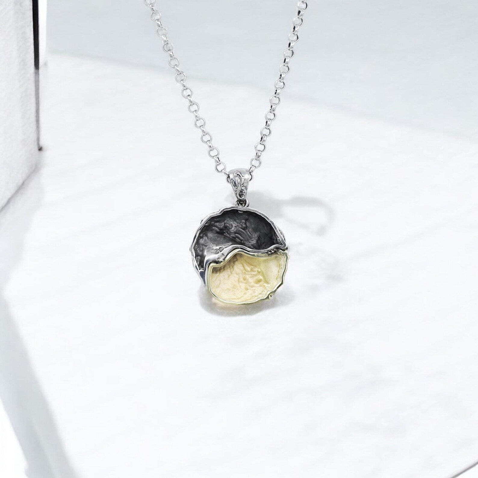 Handcrafted to perfection, this silver wolf yin yang necklace for men captures the rugged elegance of animal symbolism and spiritual balance. The powerful contrast of silver and gold-plated wolves creates a unique statement pendant, ideal for those who seek meaningful jewelry that resonates with their personal journey and inner warrior spirit.