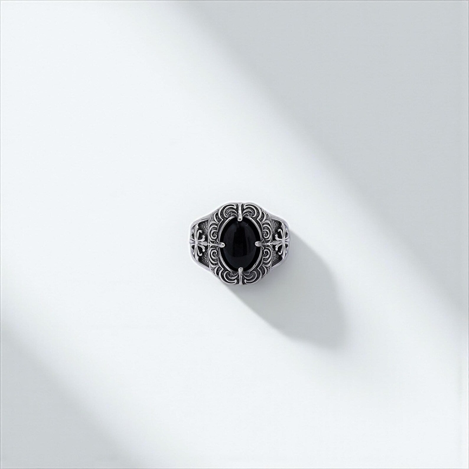 High-quality gothic onyx ring handcrafted in sterling silver, showcasing a dark and powerful aesthetic for men who appreciate alternative fashion, biker culture, and unique statement jewelry.