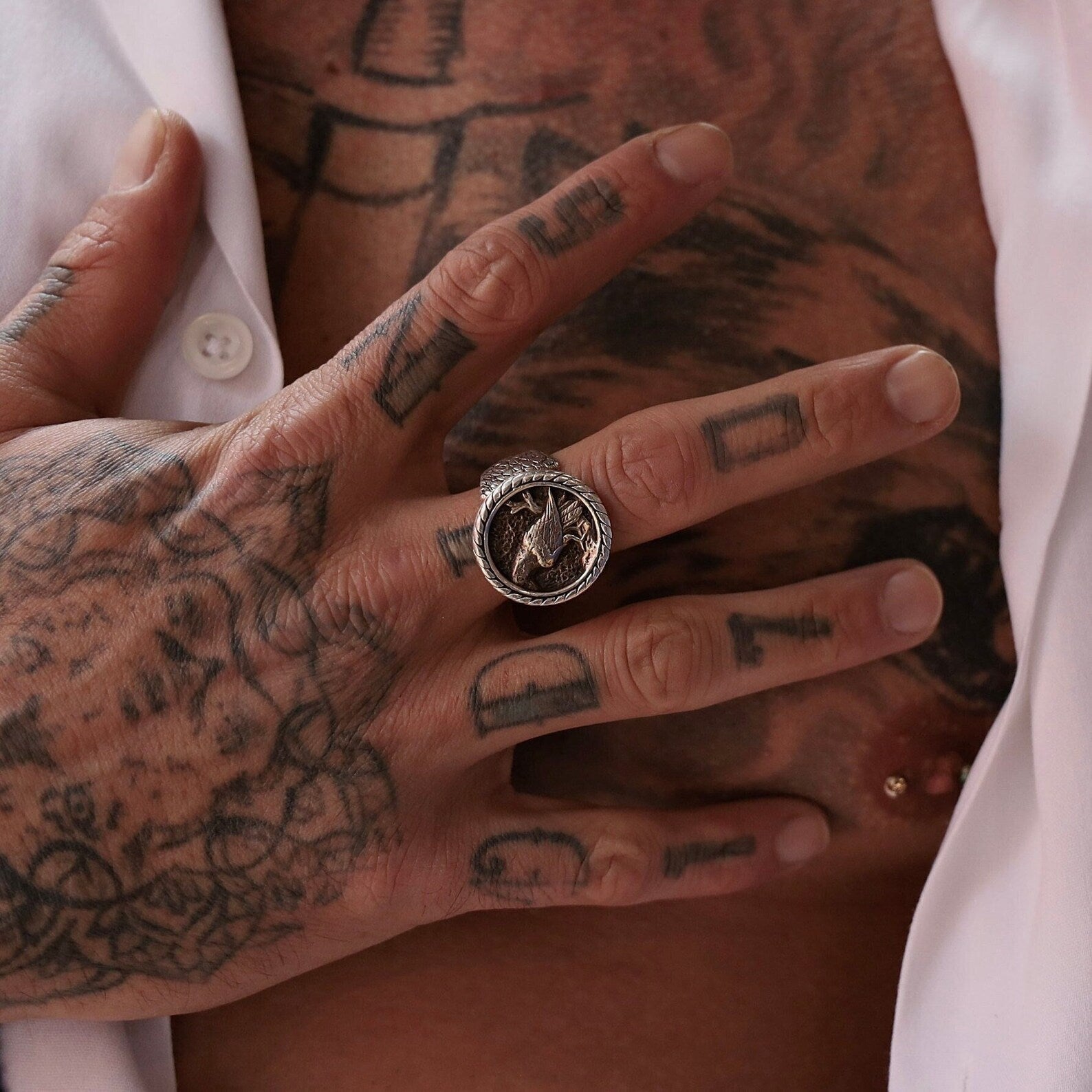 A mystic Viking raven ring made from sterling silver and carefully oxidized to highlight the deep engravings, this ring captures the essence of Norse tradition and divine insight. A standout piece for any man seeking to express power, mystery, and personal meaning through jewelry.