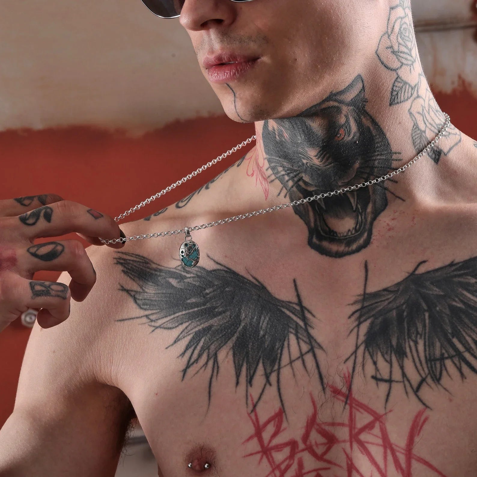 Vibrant handmade necklace crafted from 925 sterling silver with a polished turquoise gemstone set inside a world map outline. A truly meaningful and stylish gift for him or her, symbolizing exploration, freedom, and elegance.